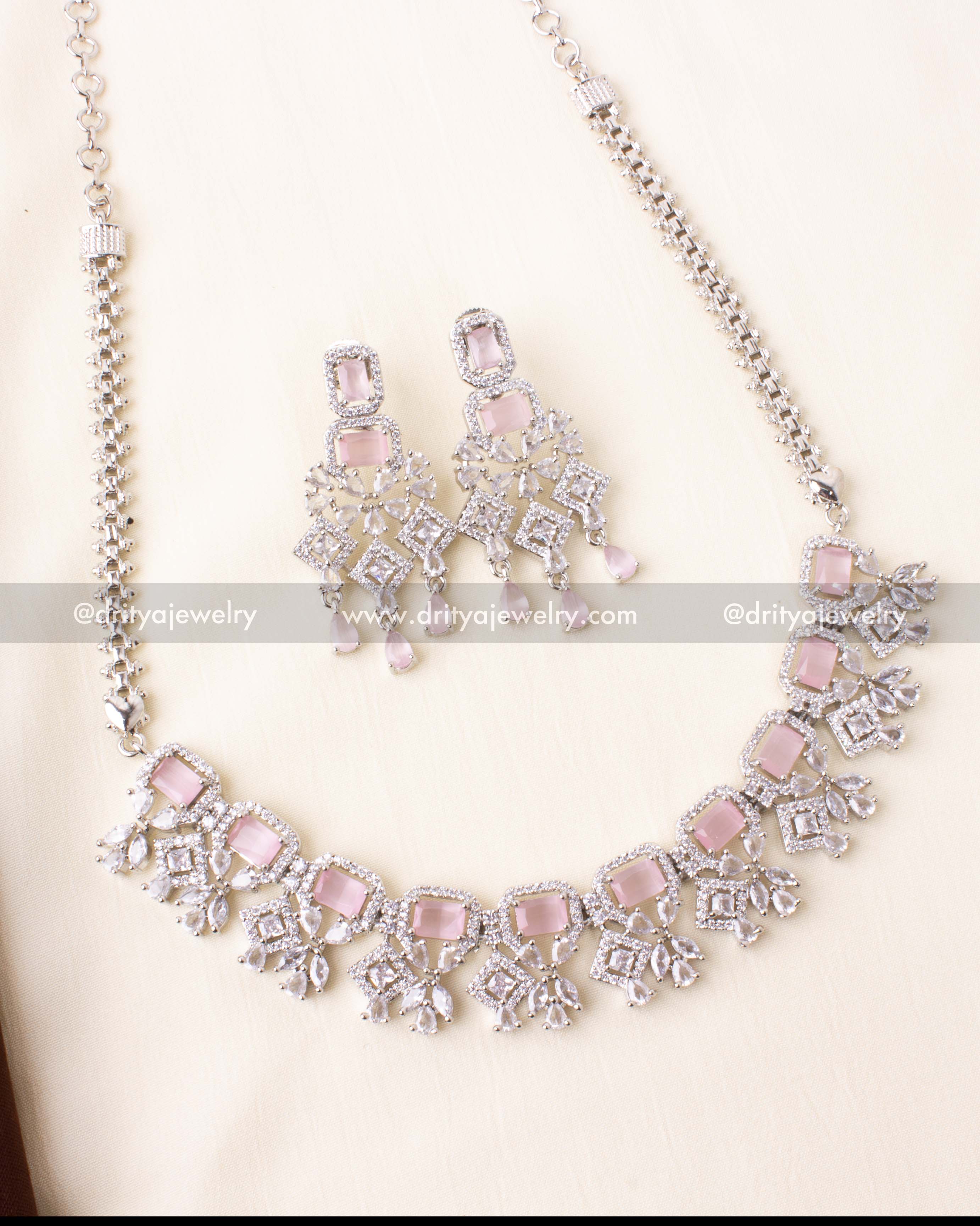 Necklace featuring blush pink rectangular stones and American diamonds in a rhodium setting.
