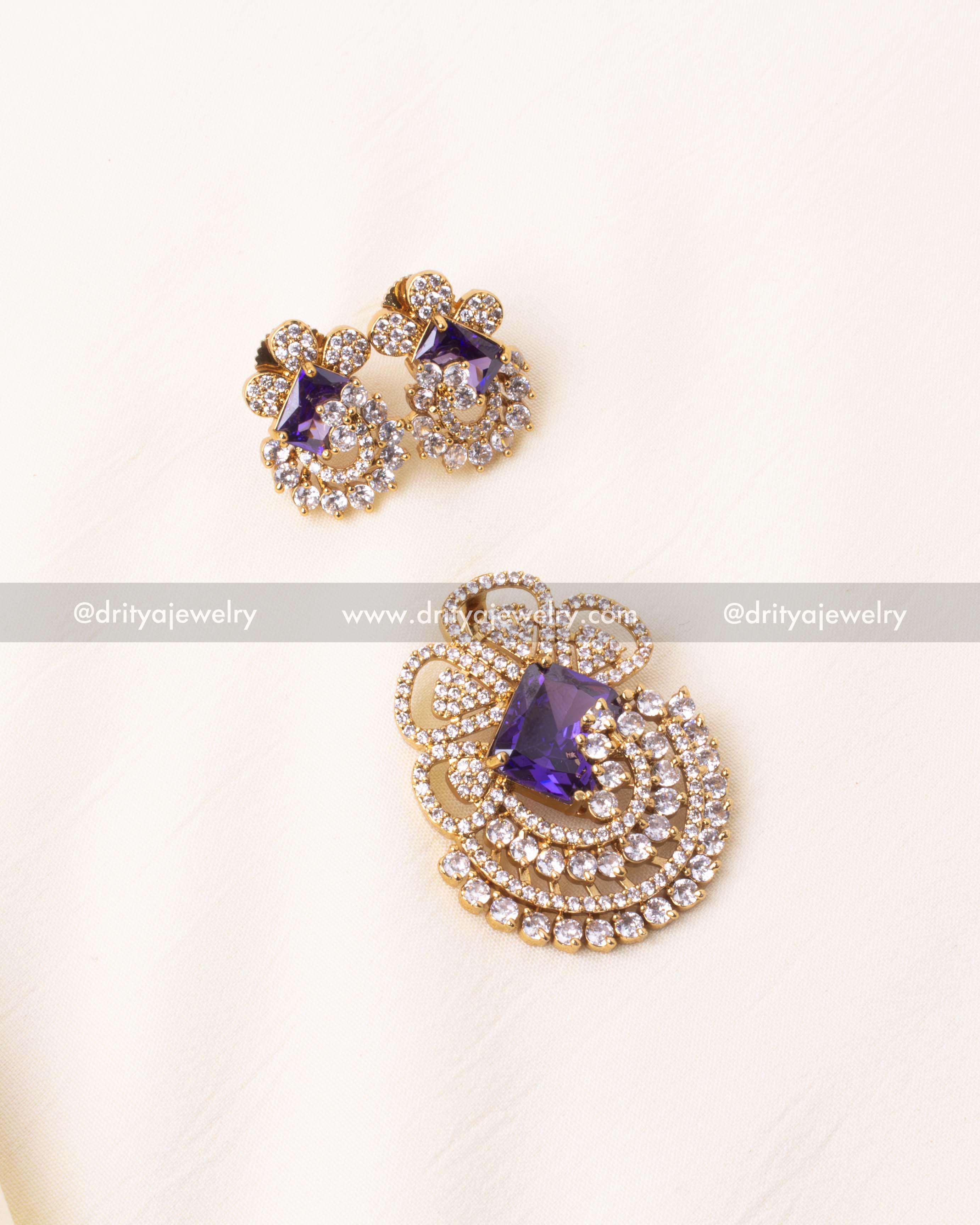 Stunning purple gemstone pendant set with a dazzling American Diamond finish.