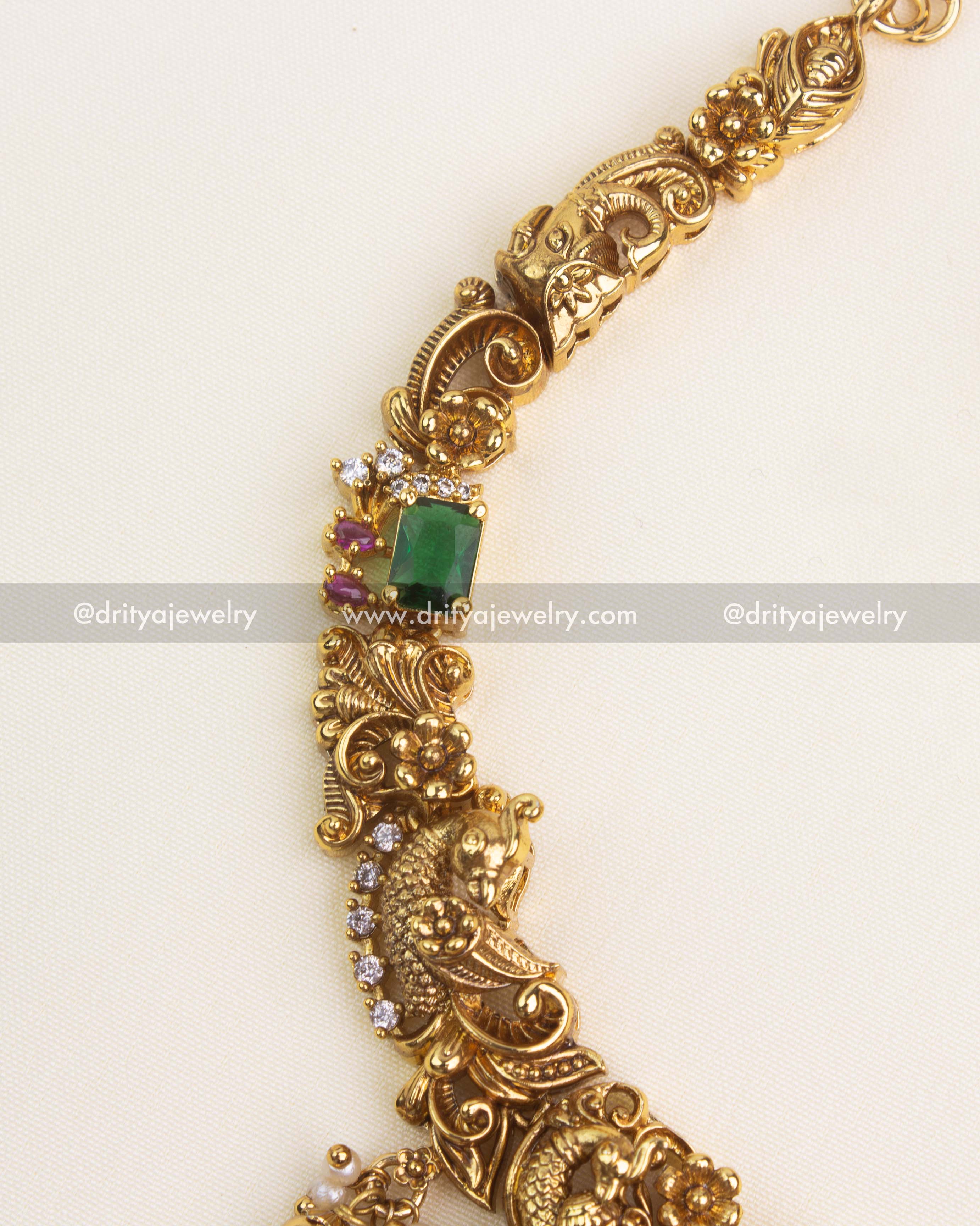 Traditional adjustable chain design with antique gold polish and nakshi accents.