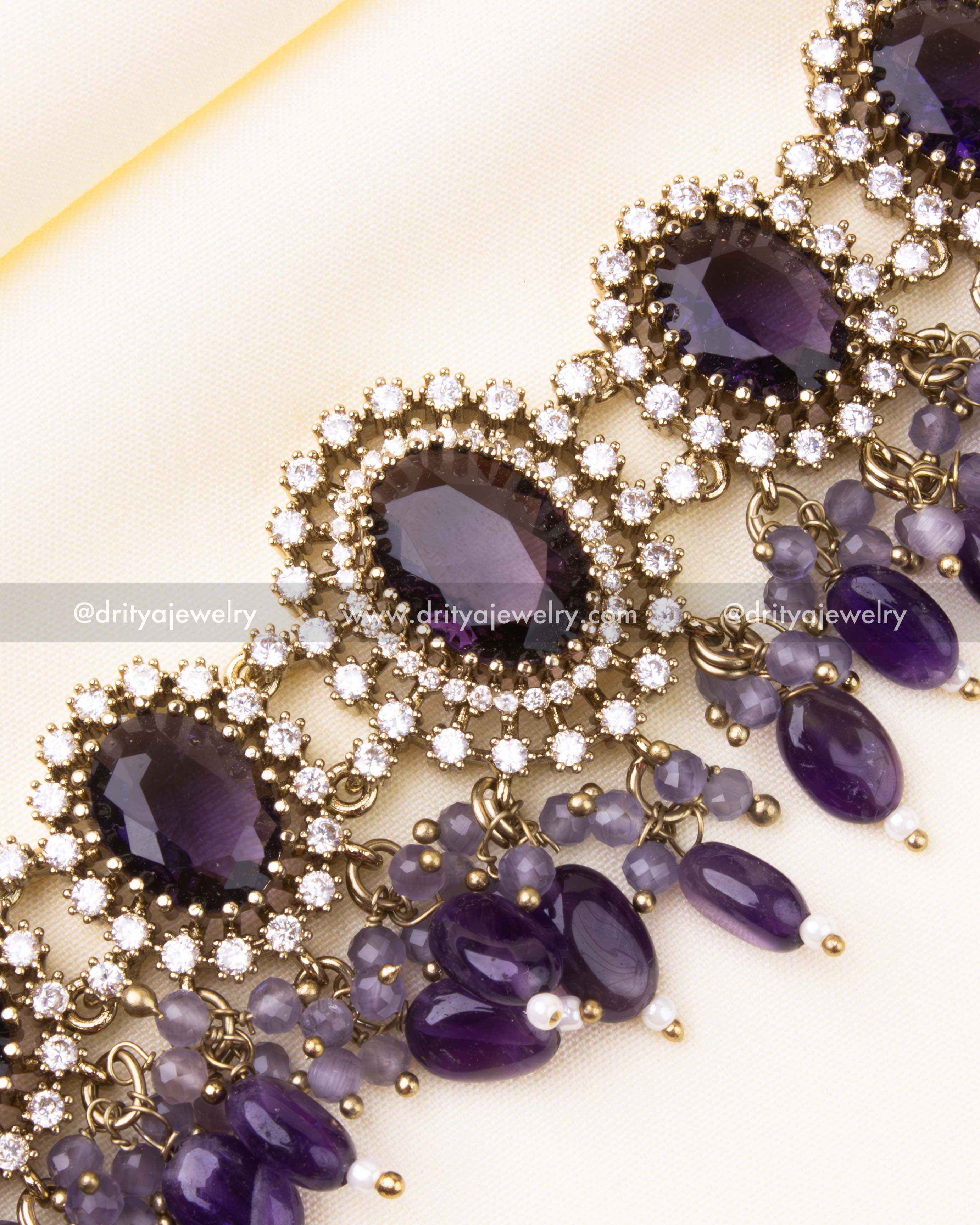 Intricate close-up of purple stone Victorian choker with bead detailing