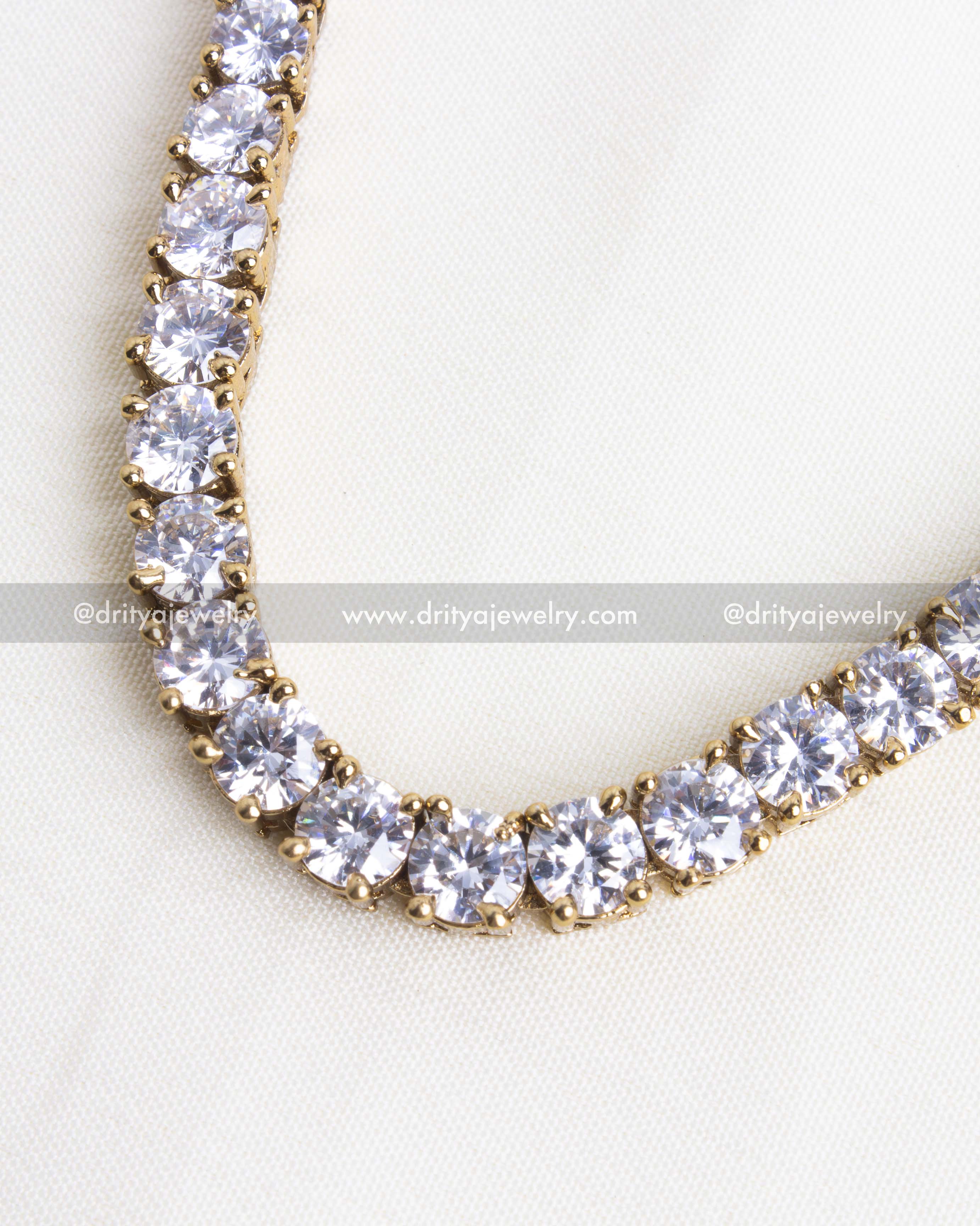 Close-up view of diamond-like necklace with sparkling CZ stones.