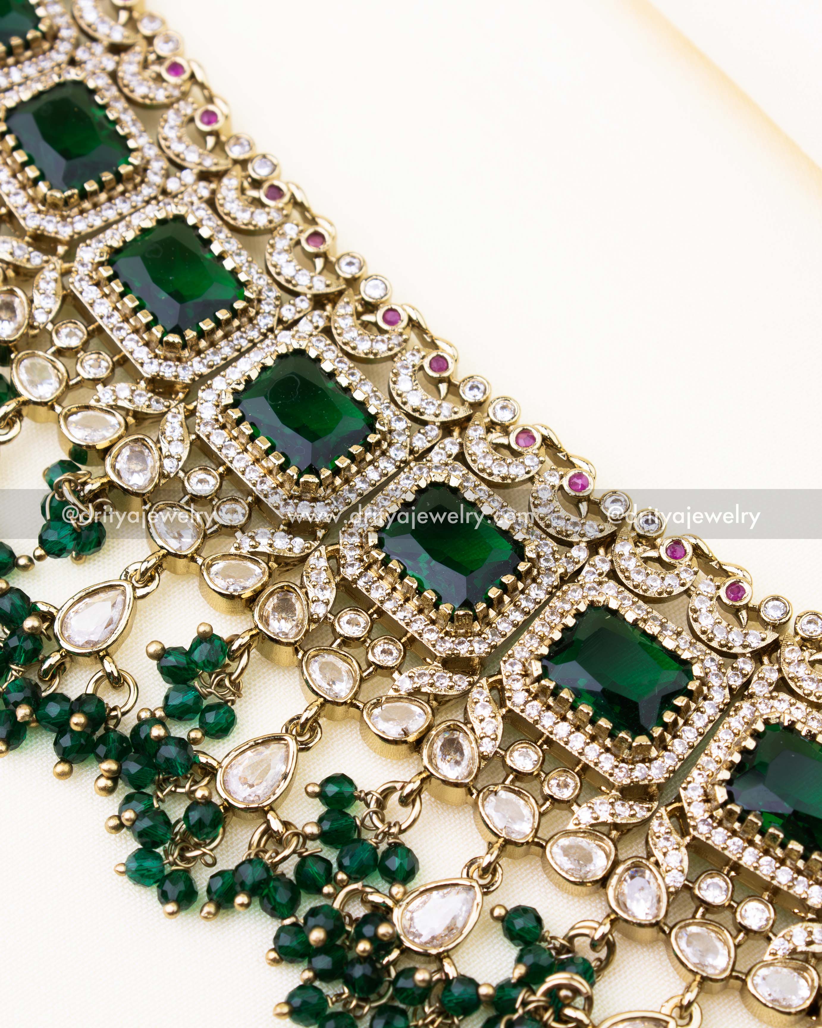 Detailed view of our emerald green Kundan choker, showcasing rich square stones, shimmering polki work, and luxurious green bead clusters — perfect for brides and festive wear.