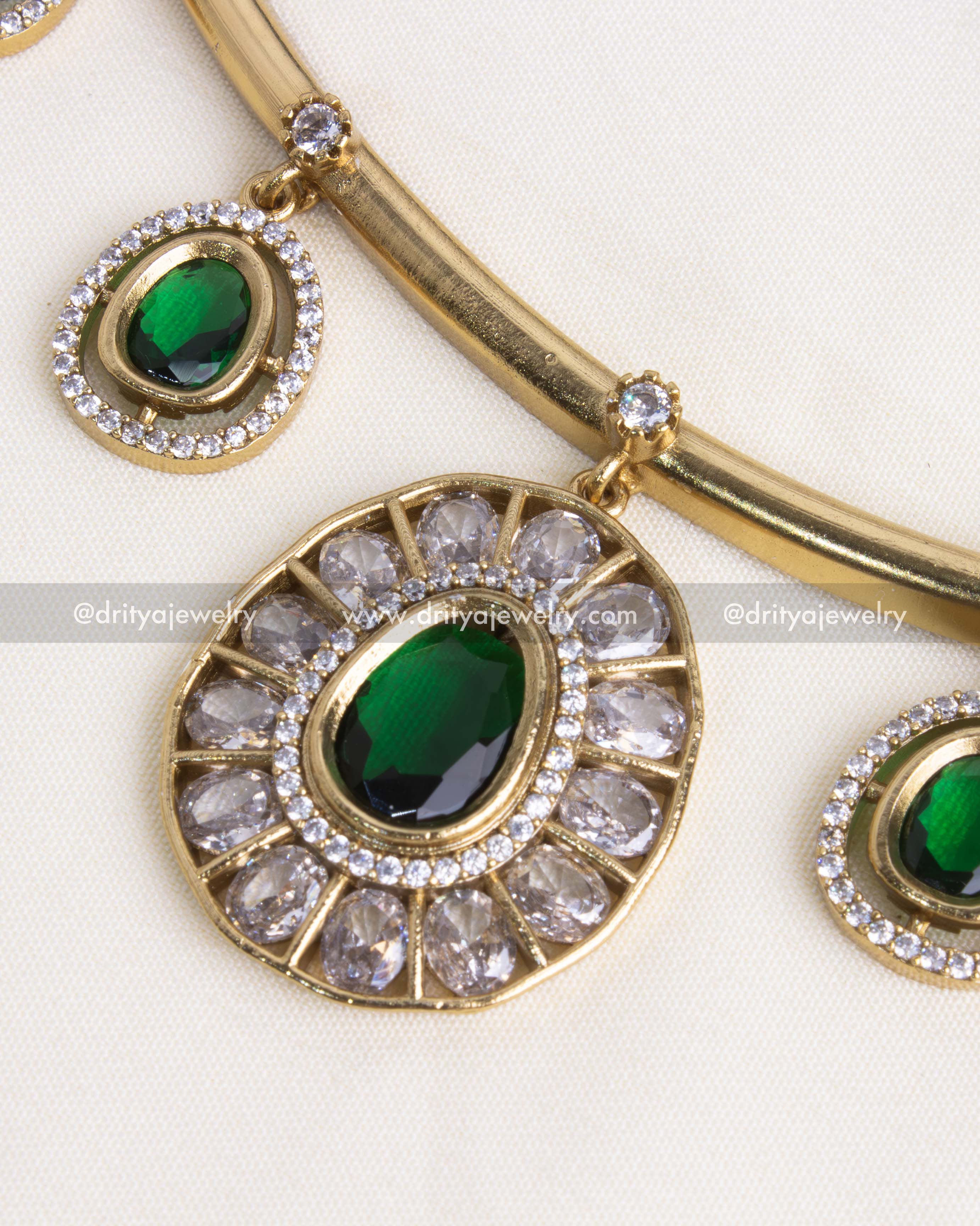 Detailed view of emerald green hasli necklace set showcasing intricate AD stonework.