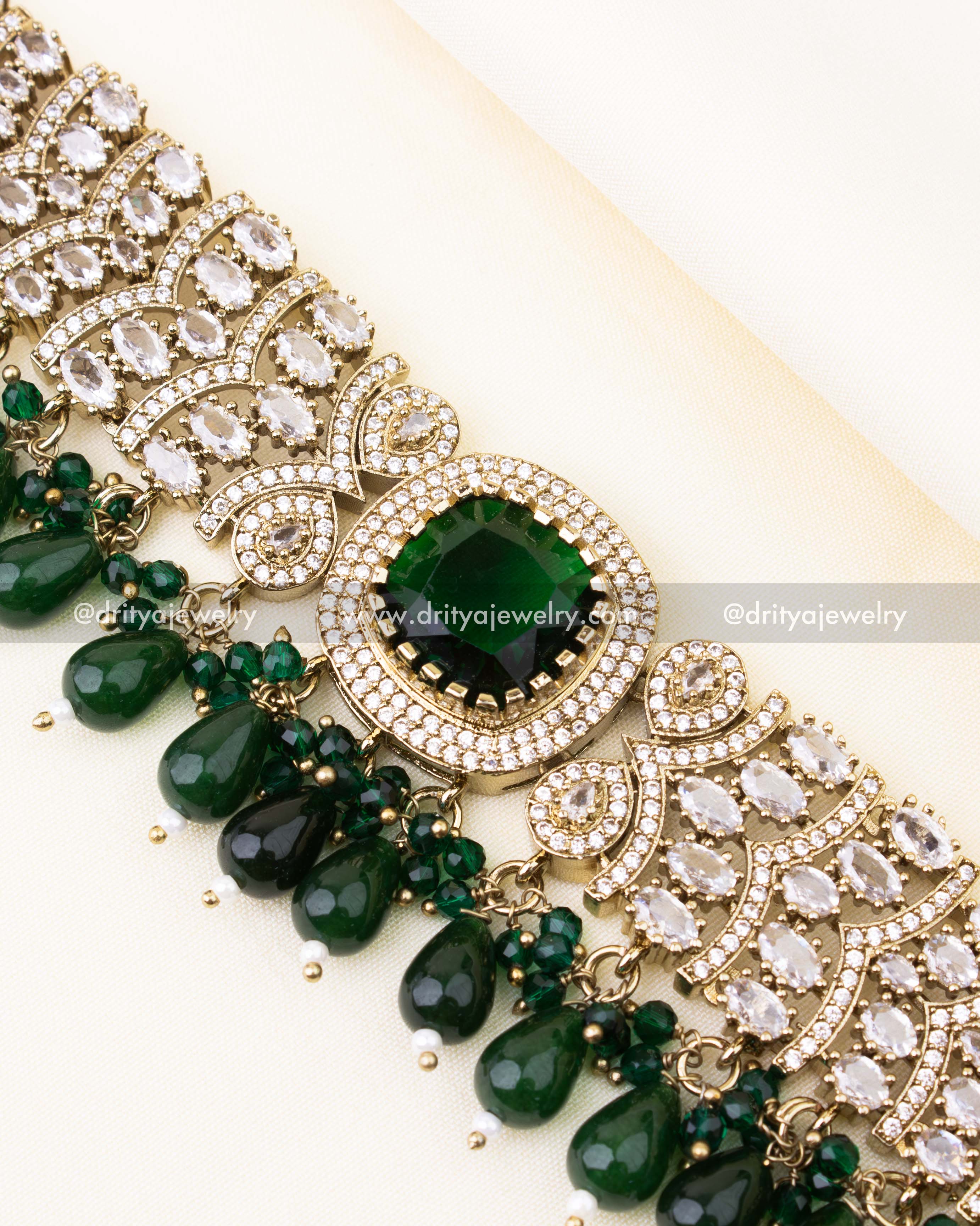 Detailed emerald green Victorian choker with intricate AD stonework.
