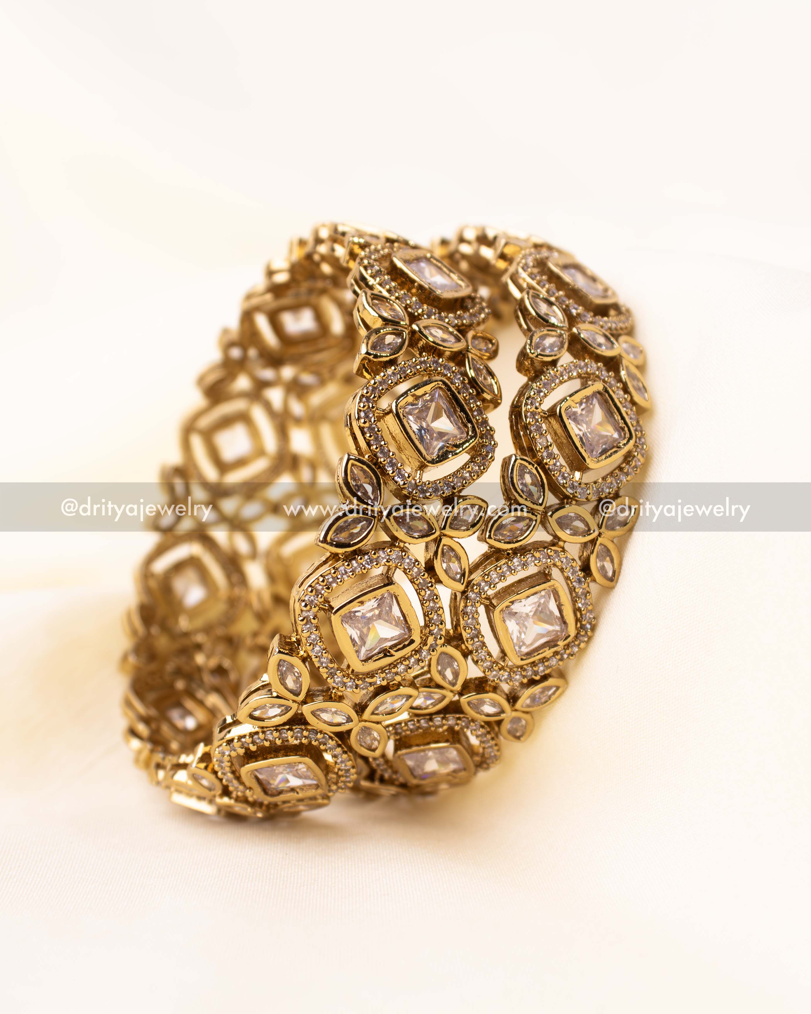 Side view of the intricately designed antique Kundan bangle set.