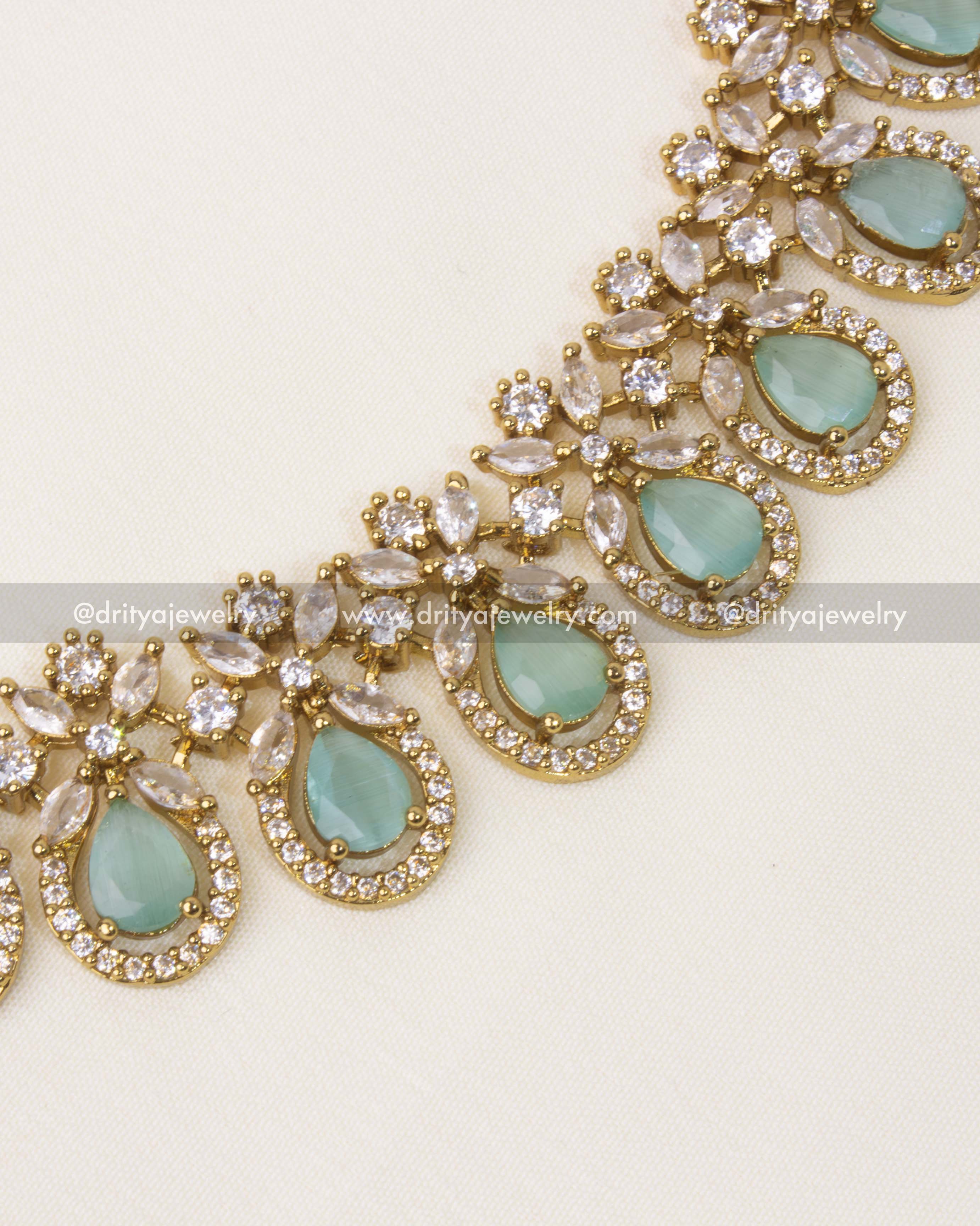 Close-up of Victorian short necklace with mint stones and intricate CZ detailing.
