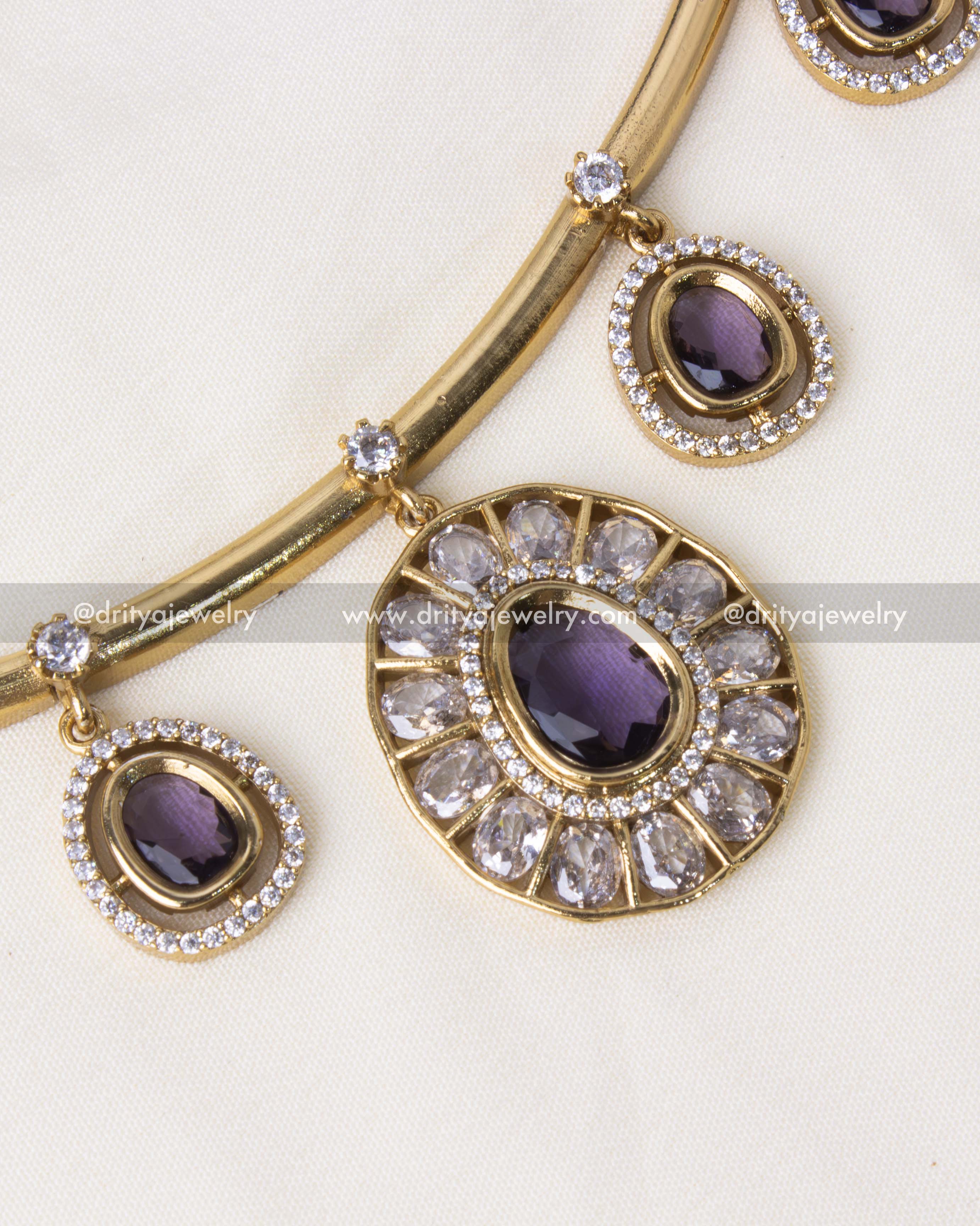 Detailed view of the purple hasli necklace set with sparkling American Diamonds.