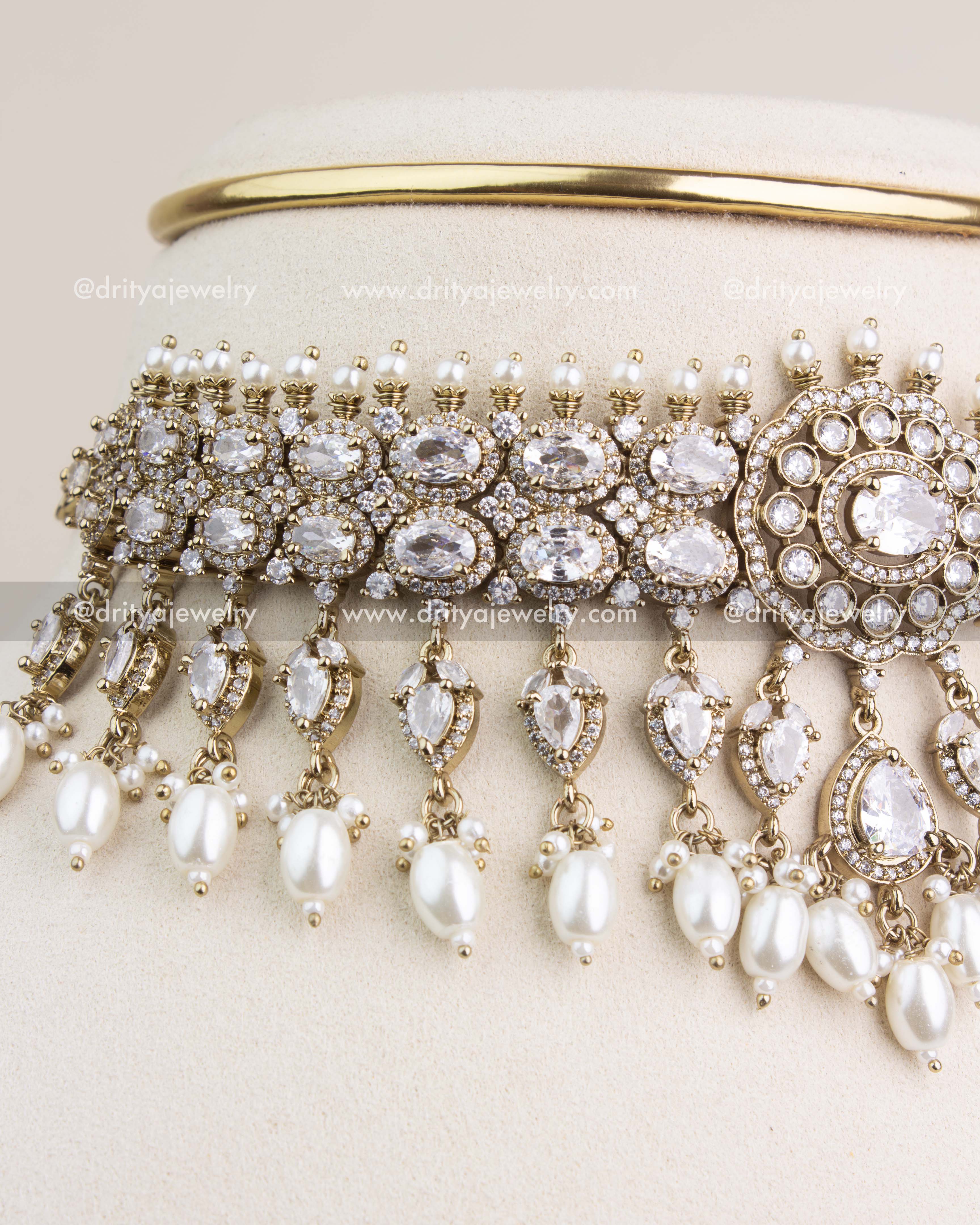 Intricately crafted Victorian choker with clear stones and lustrous pearl drops.