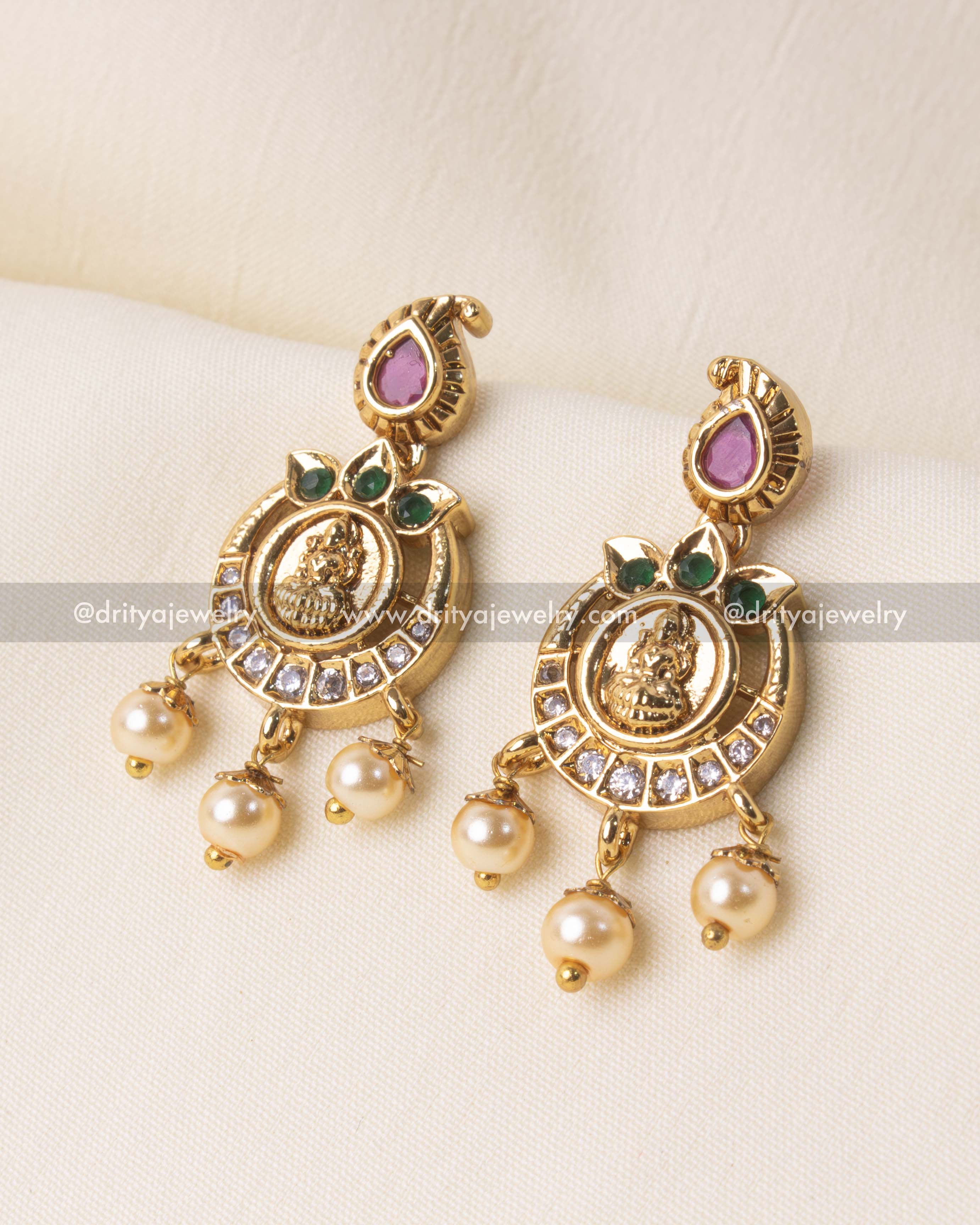 Elegant long necklace set featuring Lakshmi Devi coin motifs and polki stones with gold plating, ideal for weddings and festivities.