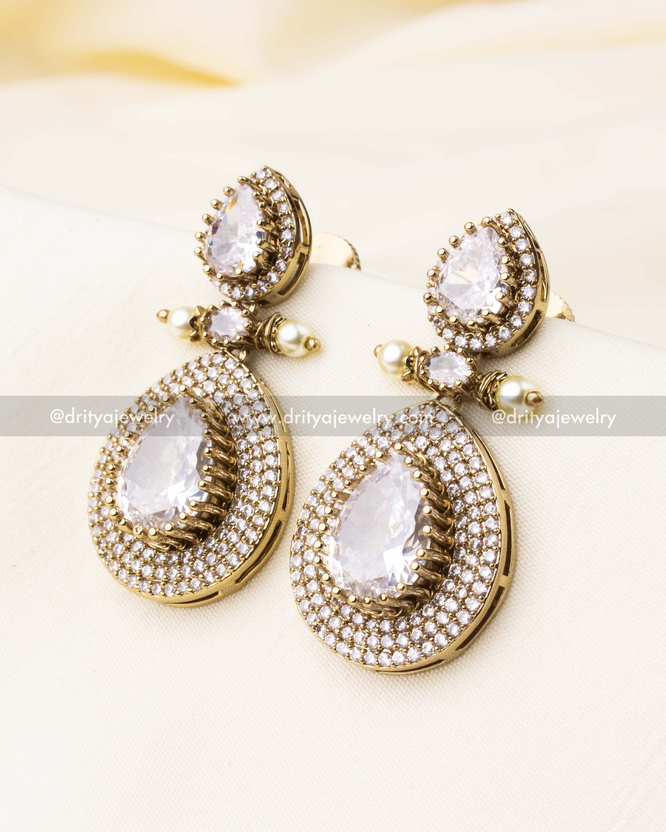 Matching CZ teardrop earrings from the Victorian necklace set with concentric stone detailing.