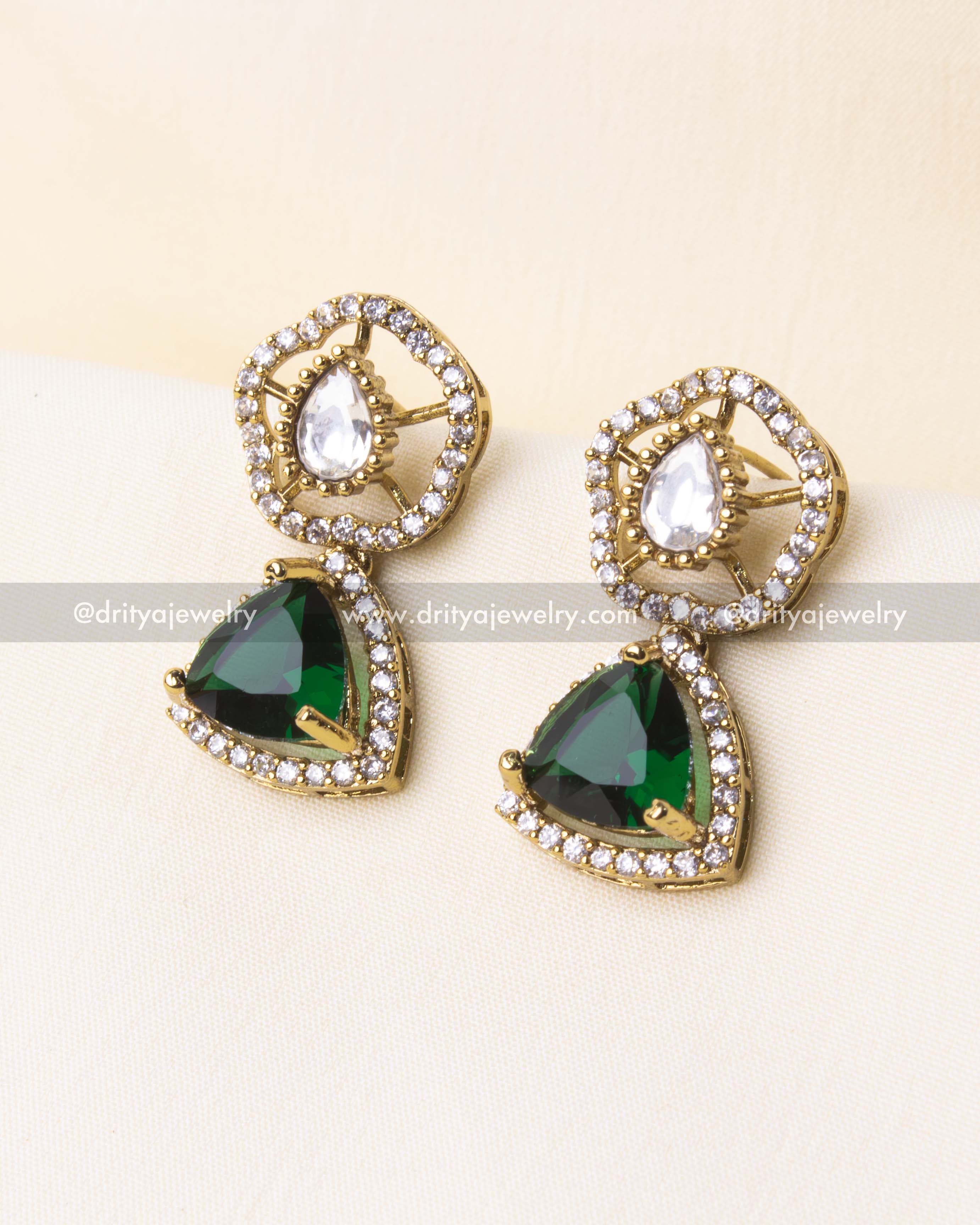 Detailed close-up of emerald green pendant on premium Kanti short necklace.