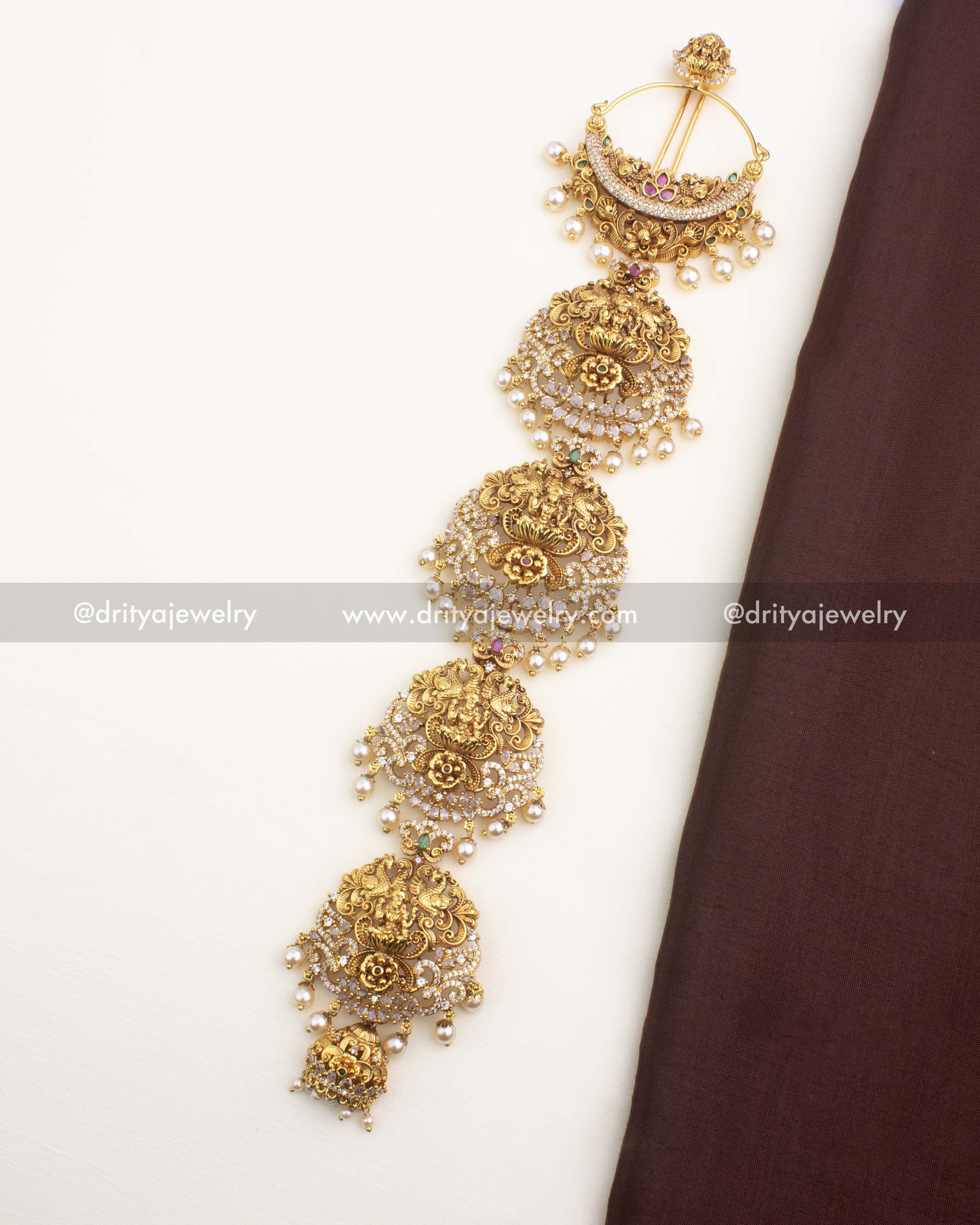 Antique gold Temple Jada Billa with Lakshmi motif and layered panels – full vertical view.