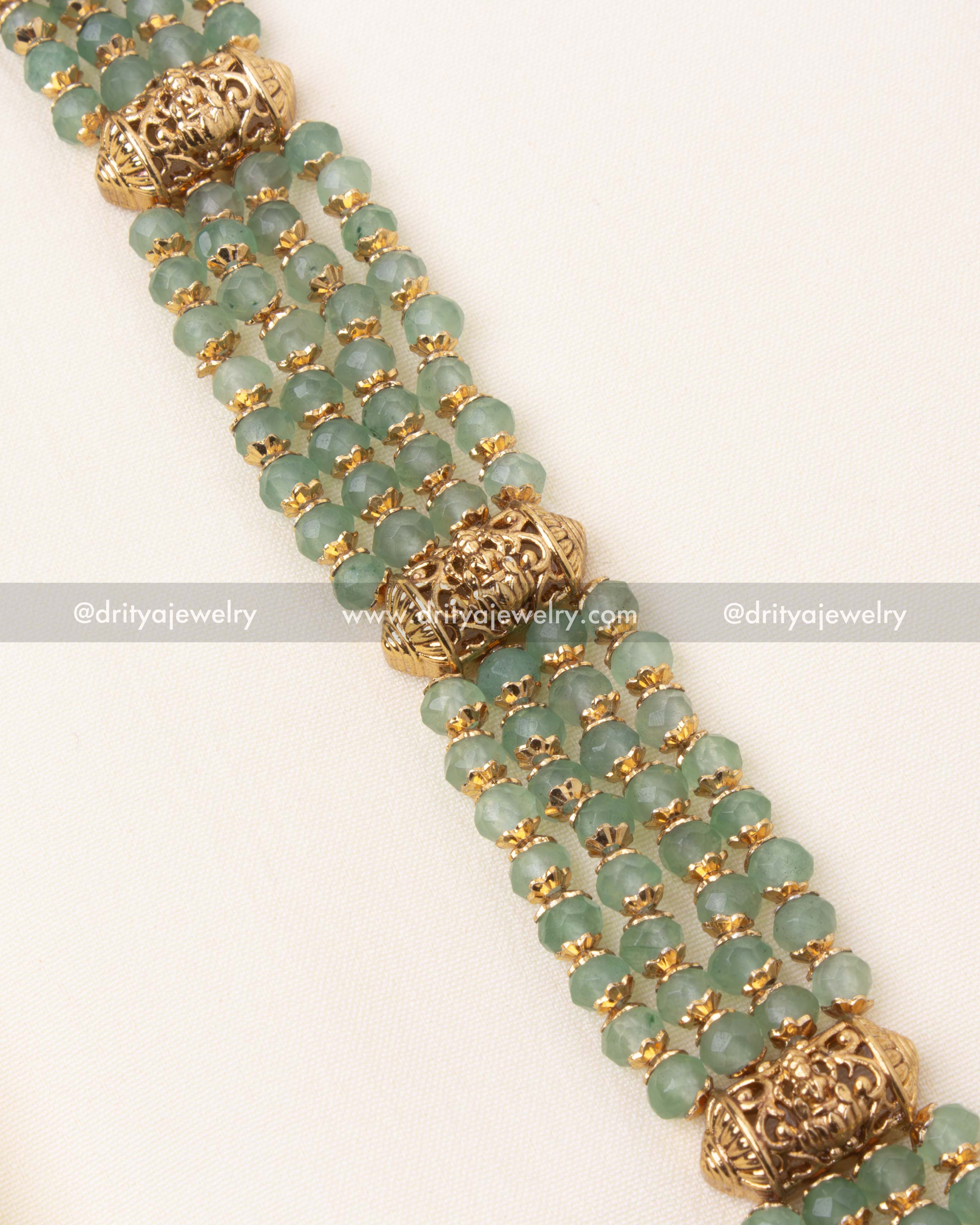 Premium green bead strands with decorative gold-plated connectors.