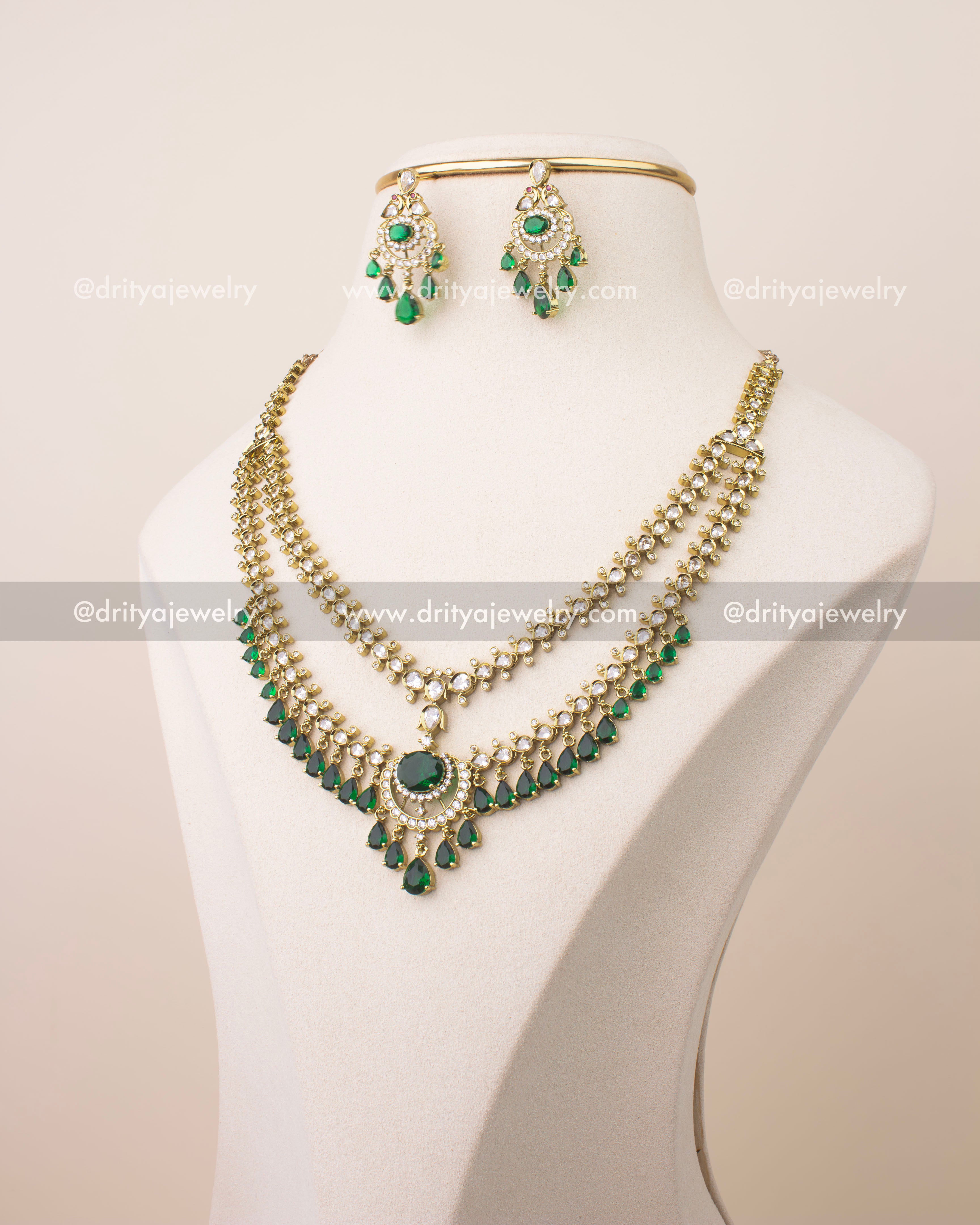 Victorian layered short necklace set with emerald green stones and gold finish