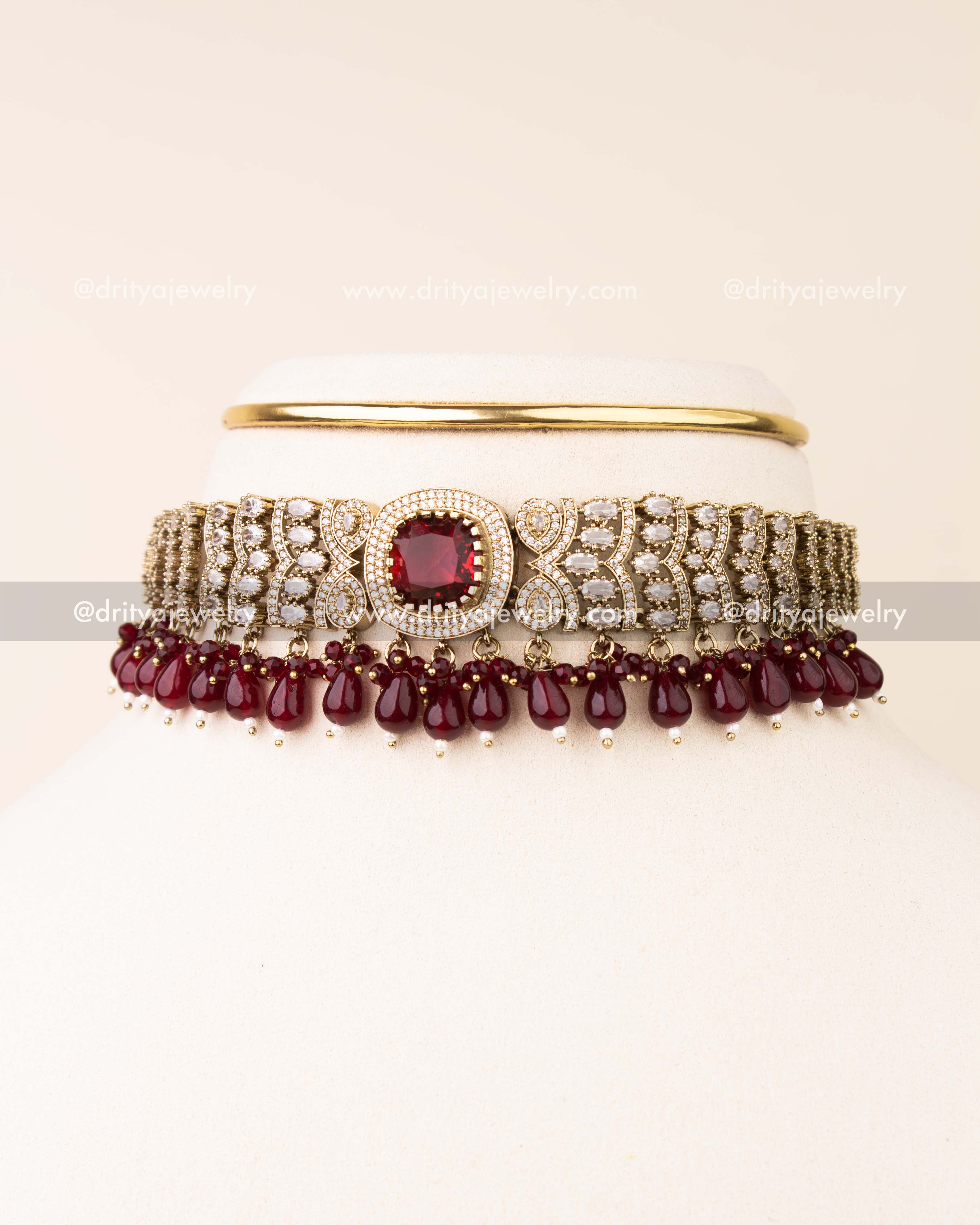 Ruby red Victorian choker with bead drops and matching earrings.