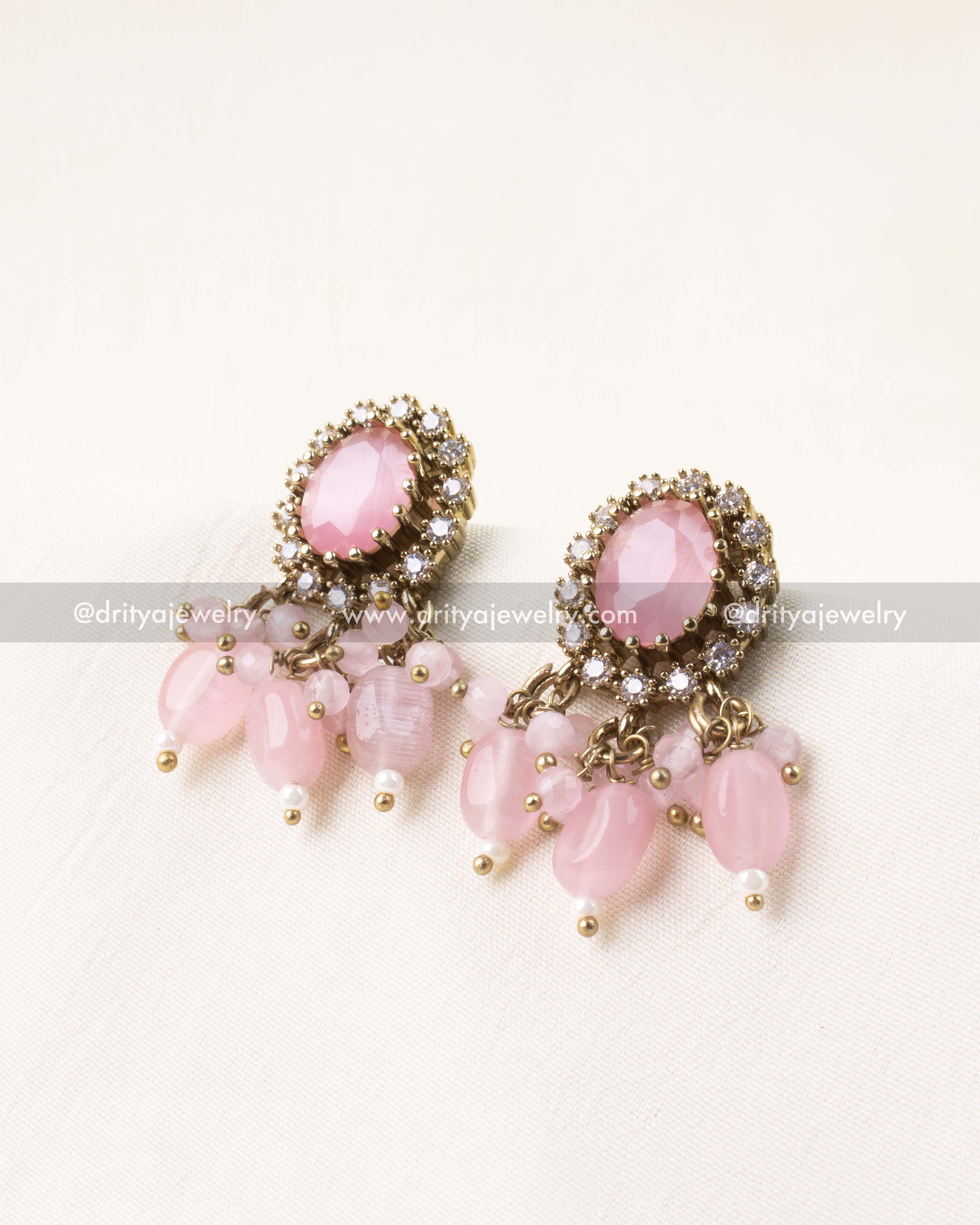 Blush pink earrings with dangling beads and Victorian finish