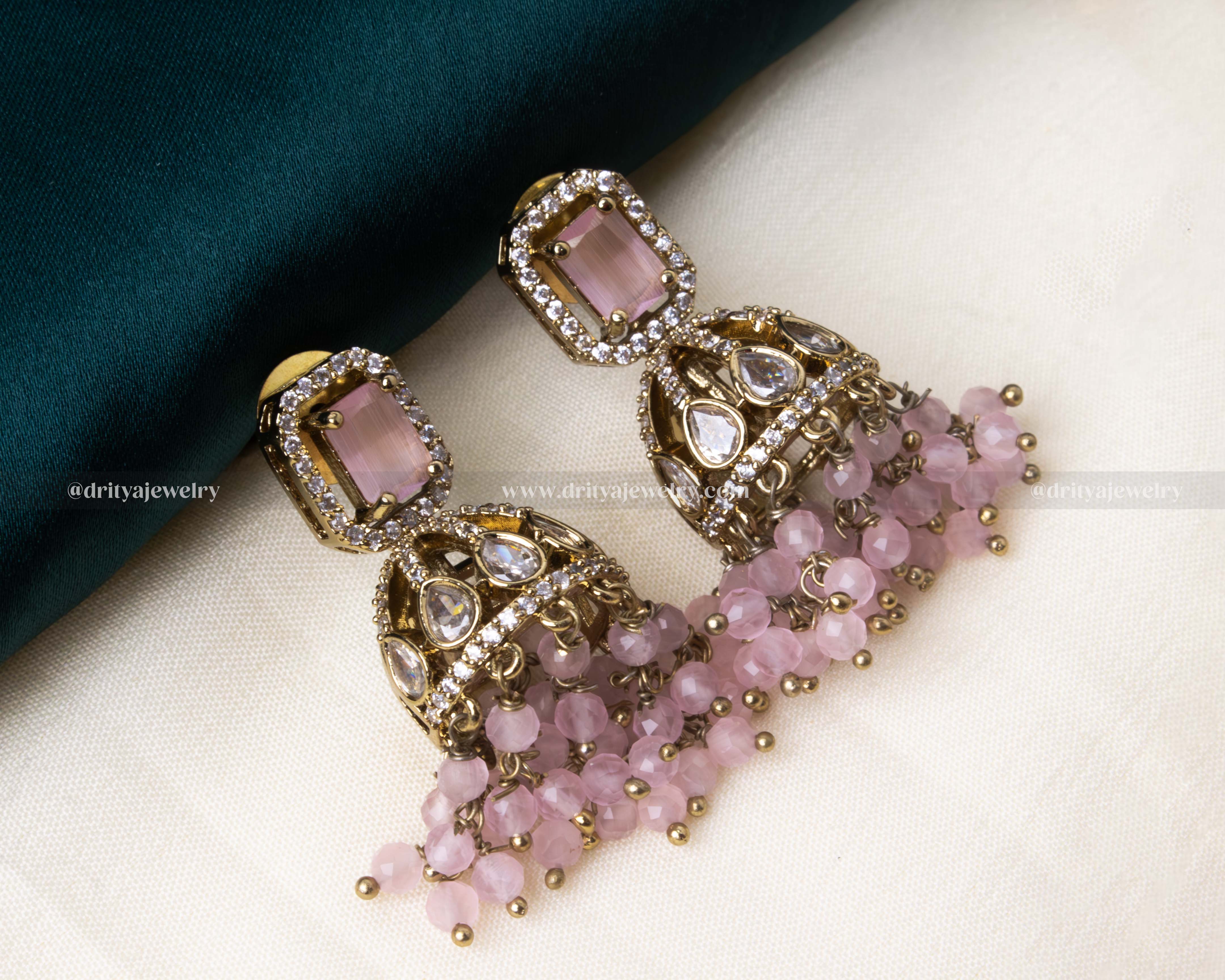Matching Jhumka Earrings" Alt Text: "Victorian jhumka earrings with blush pink bead drops and intricate AD stonework.