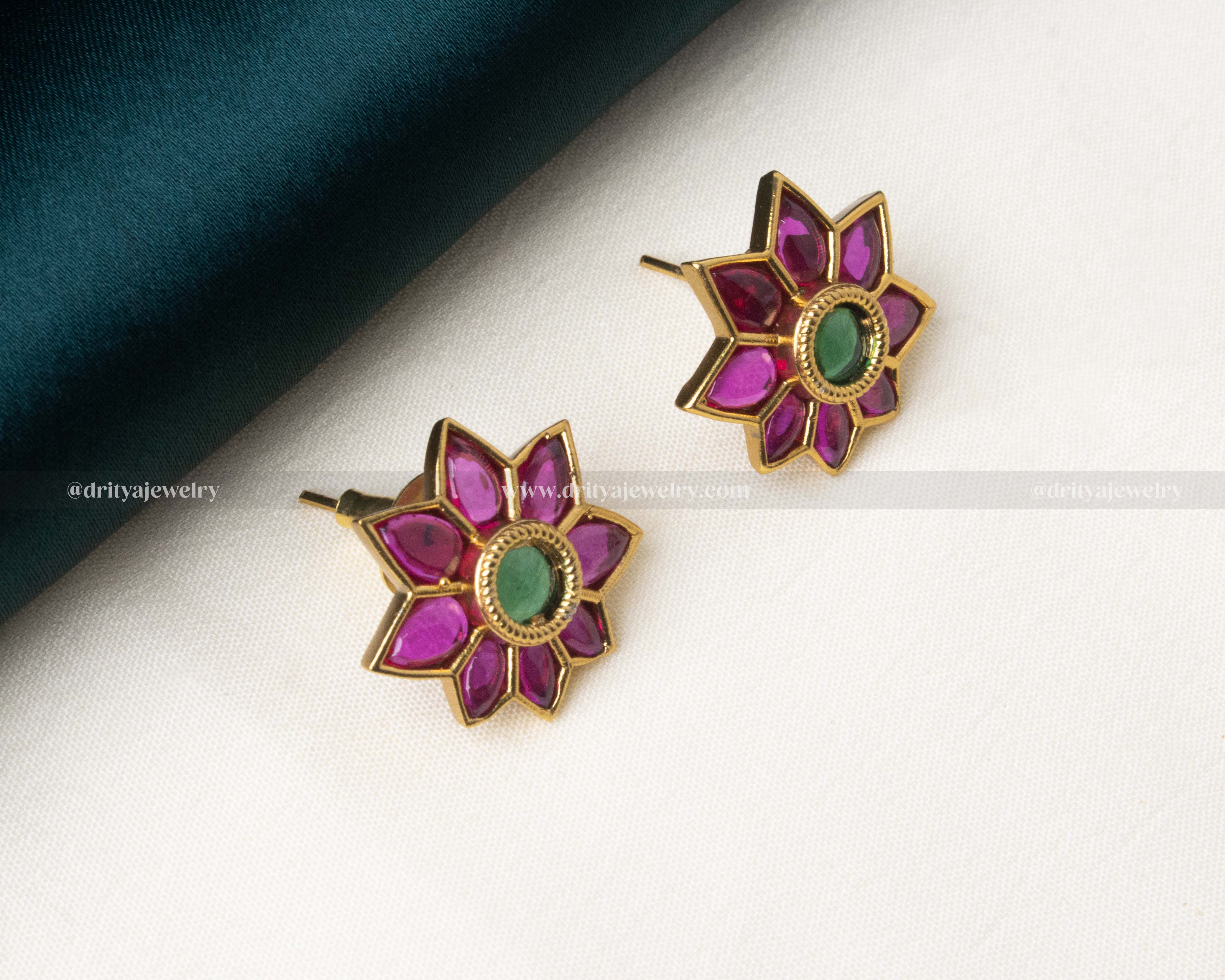 Elegant floral studs with green and pink kemp accents.