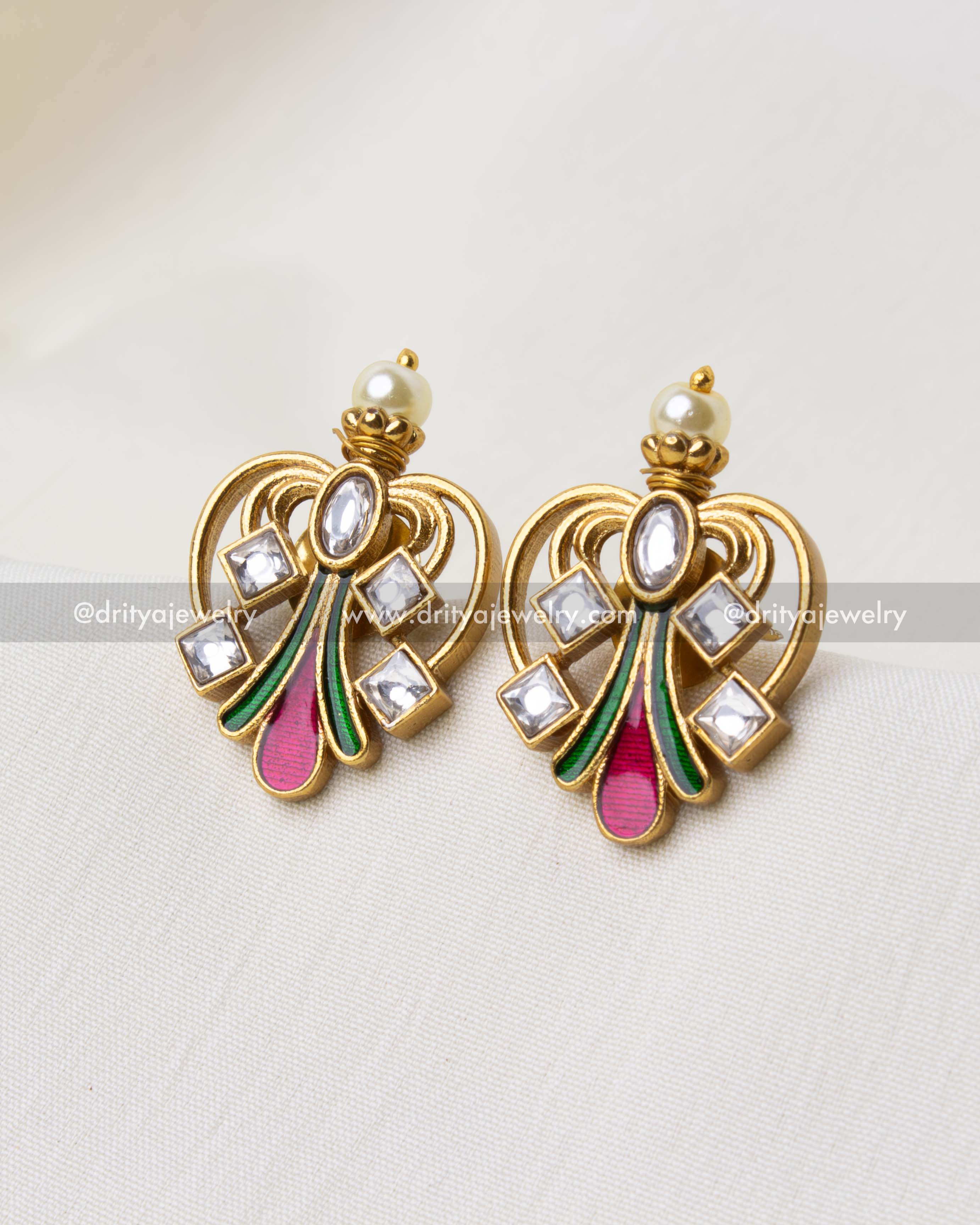 Peacock-style gold-plated earrings with red and green enamel and pearl accents.