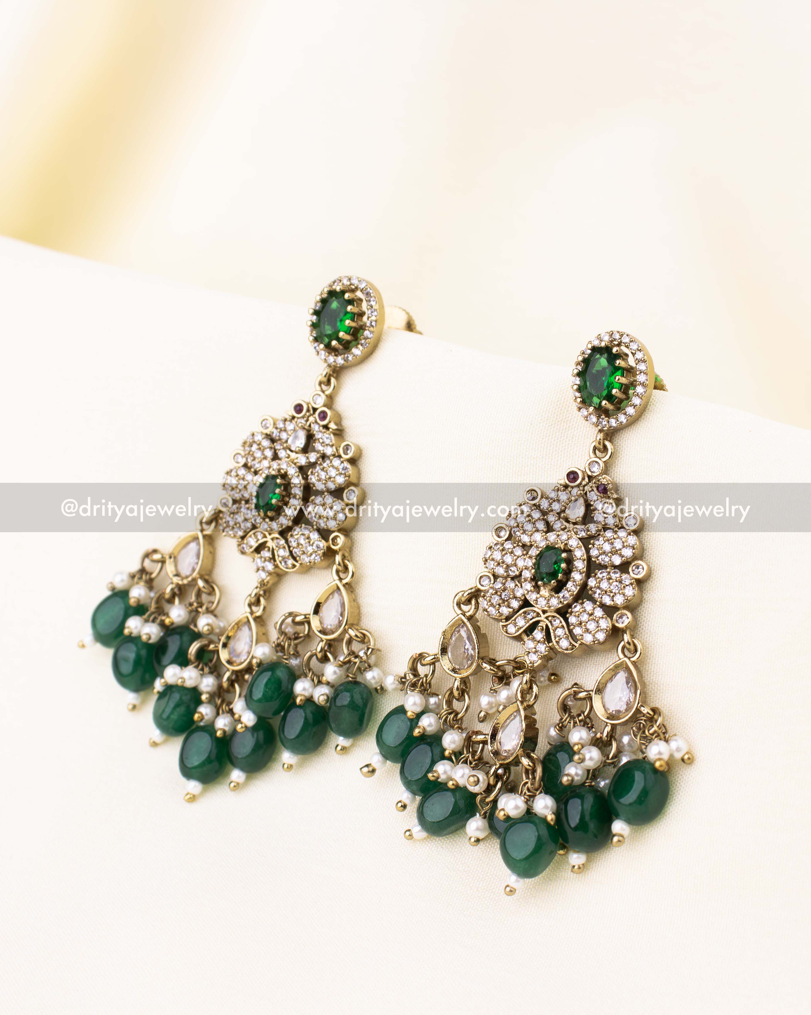 Pair of Victorian earrings featuring emerald green beads and CZ stones matching the choker necklace.