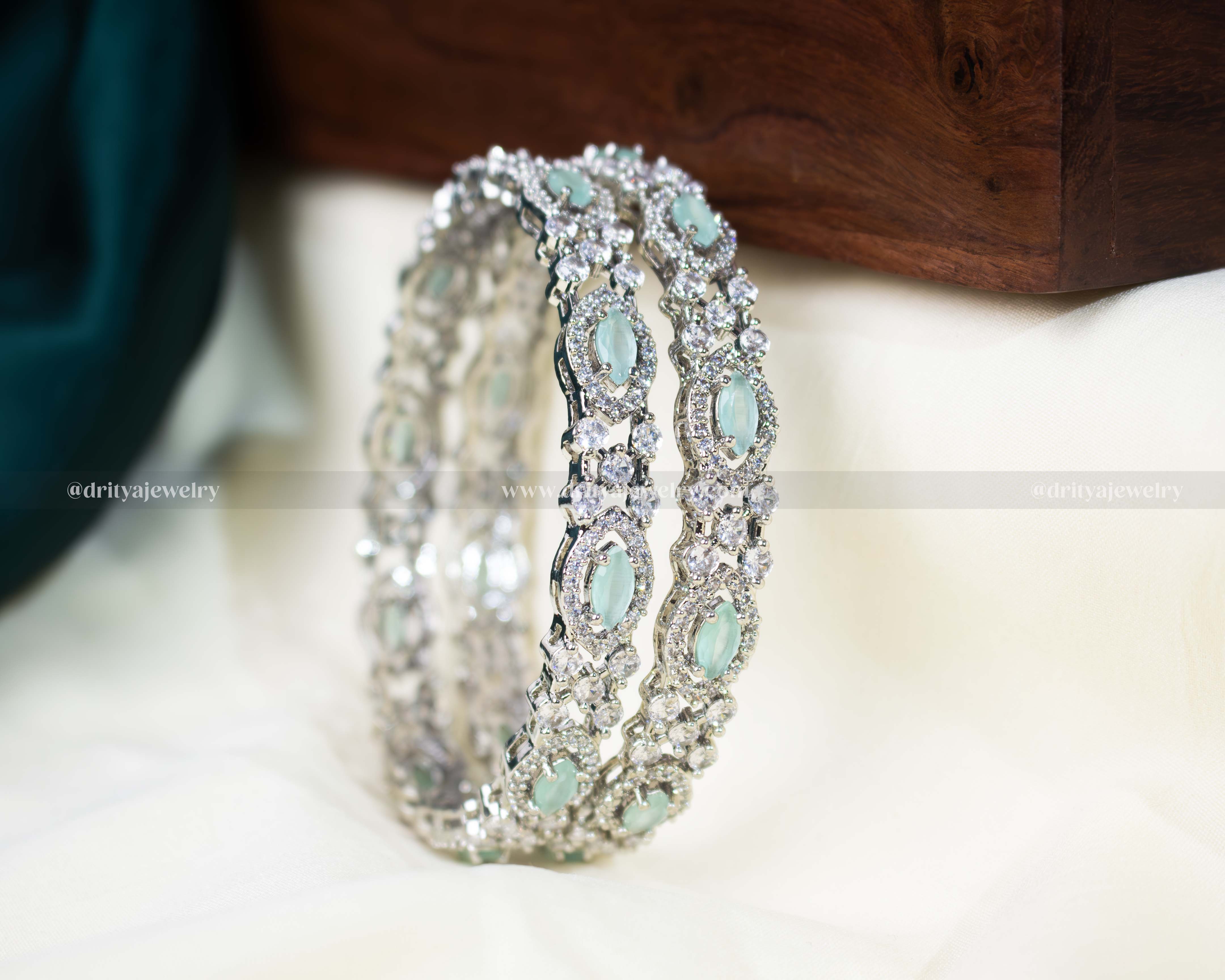 Front view of Mint Green CZ Bangles, showcasing the intricate rhodium plating and sparkling stone settings by Dritya Jewelry.
