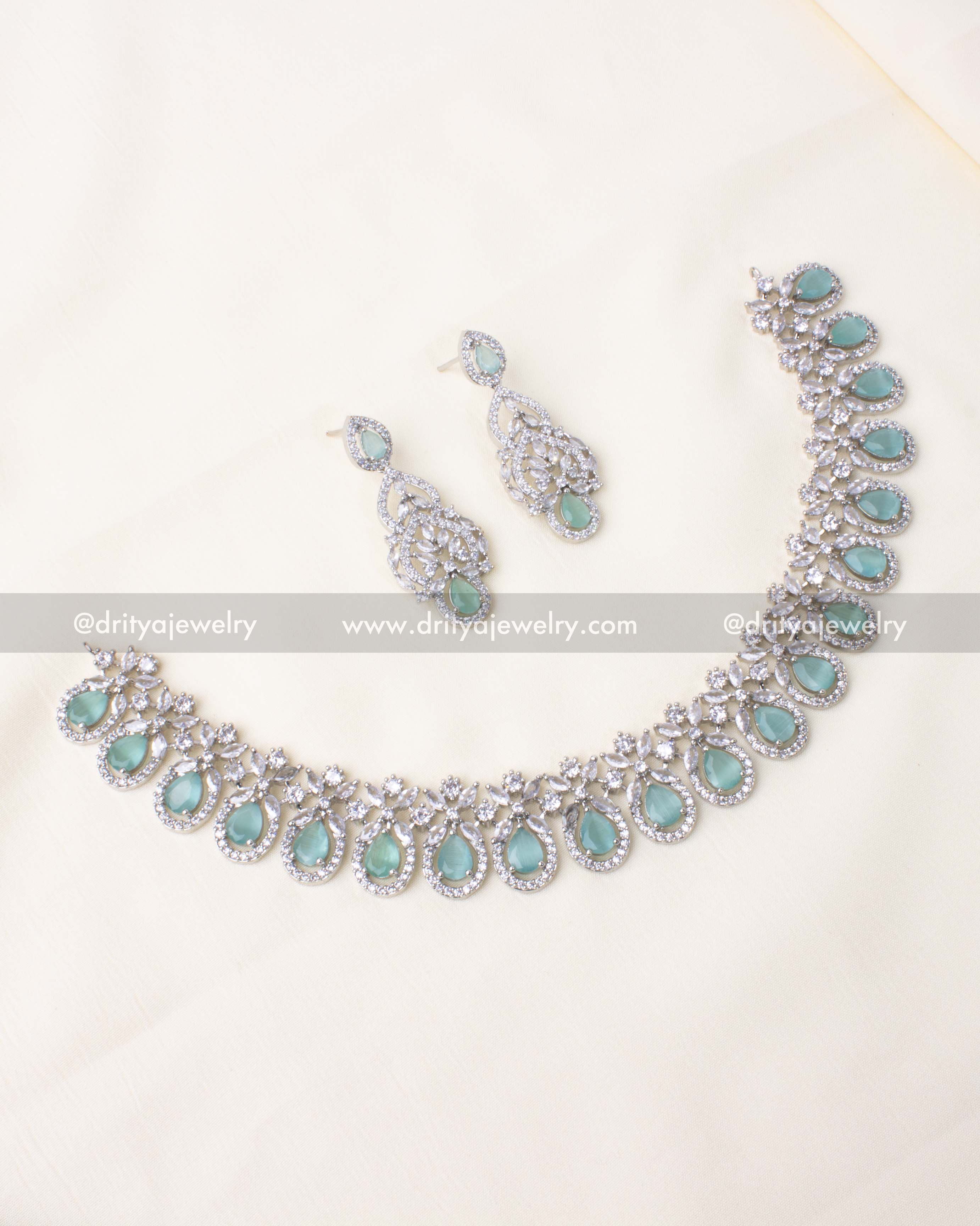Mint Zircon Short Necklace Set with CZ Stones" Alt Text: "Mint Zircon necklace set with cubic zirconia stones, including matching drop earrings.