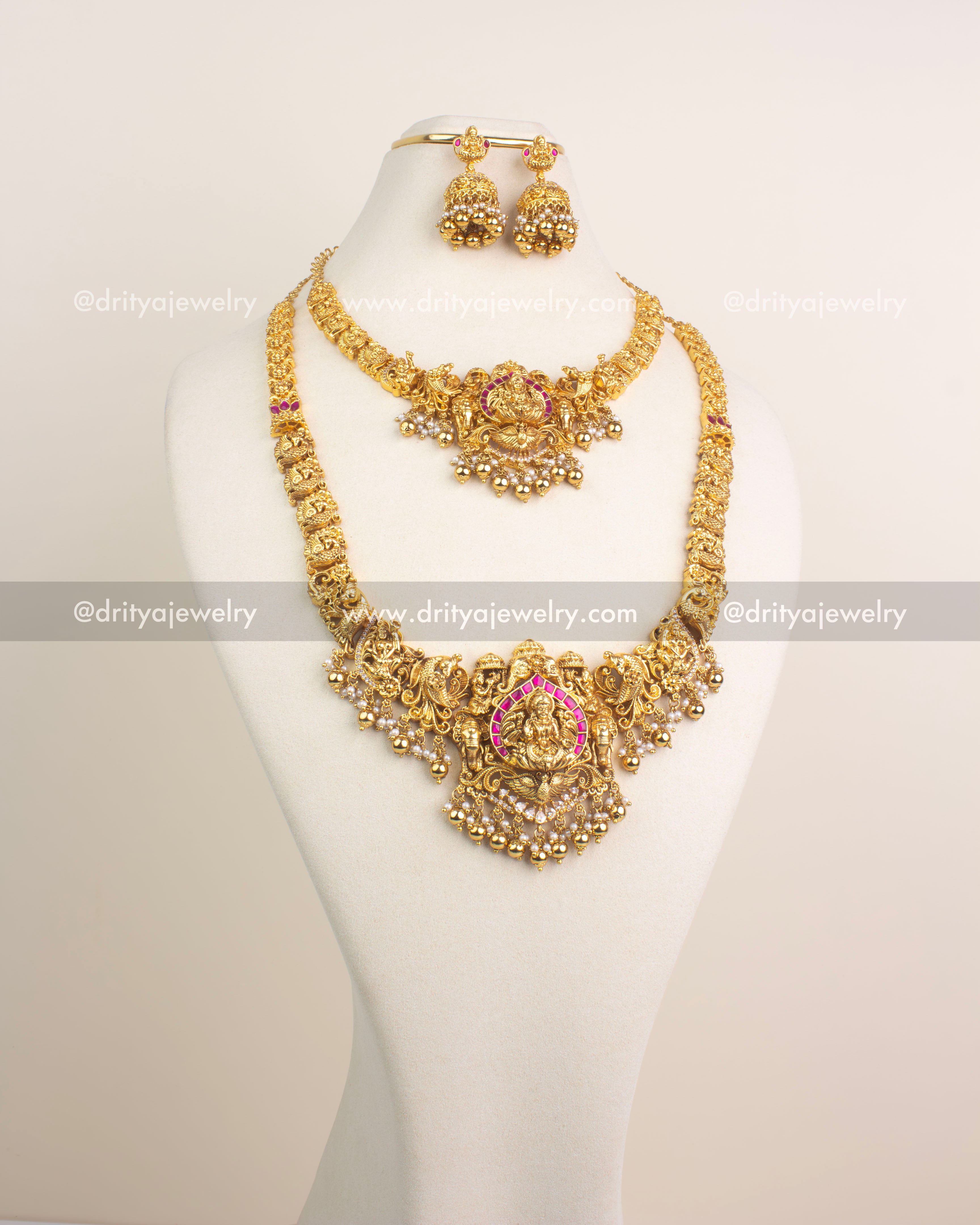 Antique gold temple combo set with Lakshmi Devi pendant and ruby Kemp stones.