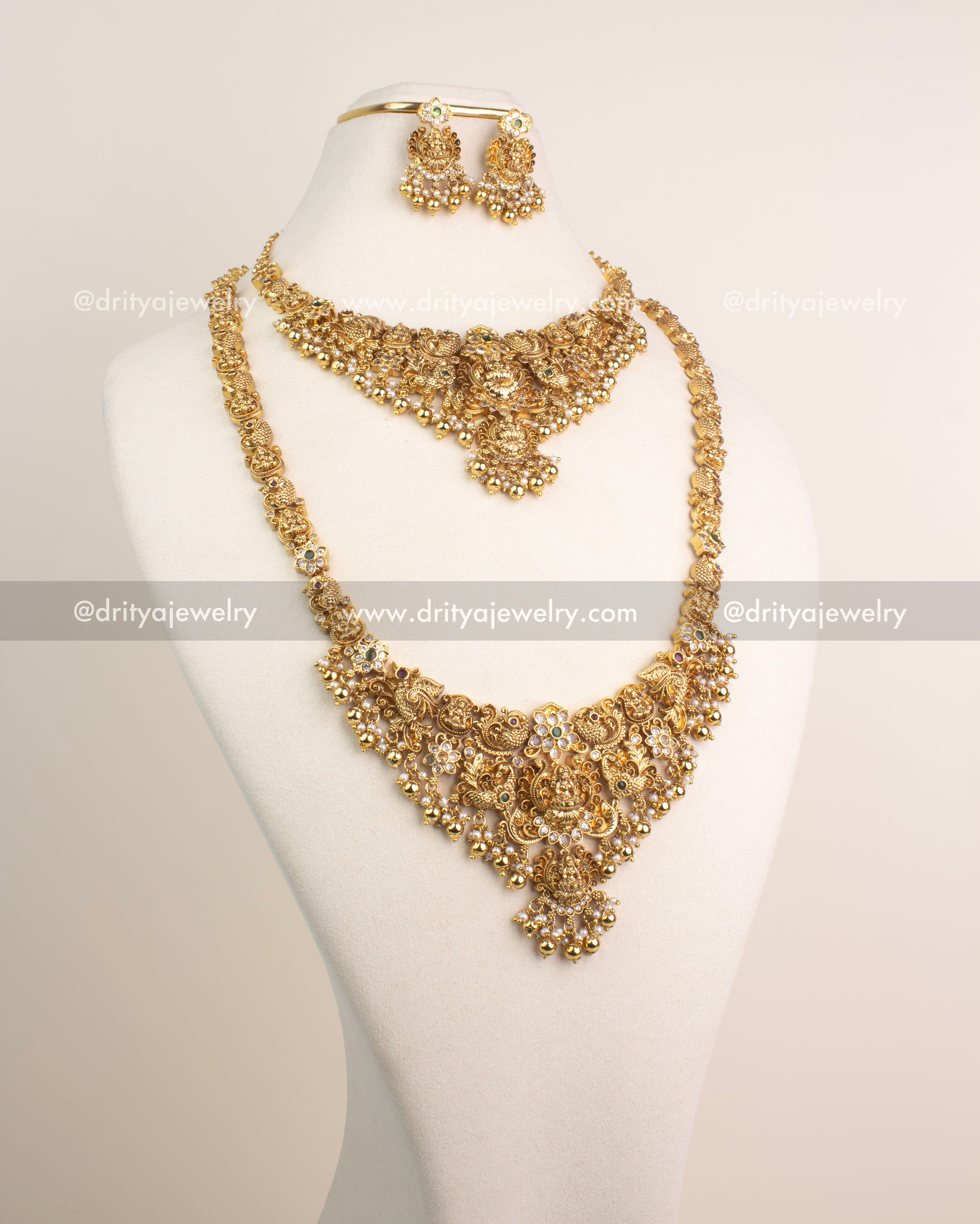 Antique gold temple jewelry combo set with Lakshmi motifs, short and long necklaces, and matching jhumkas.