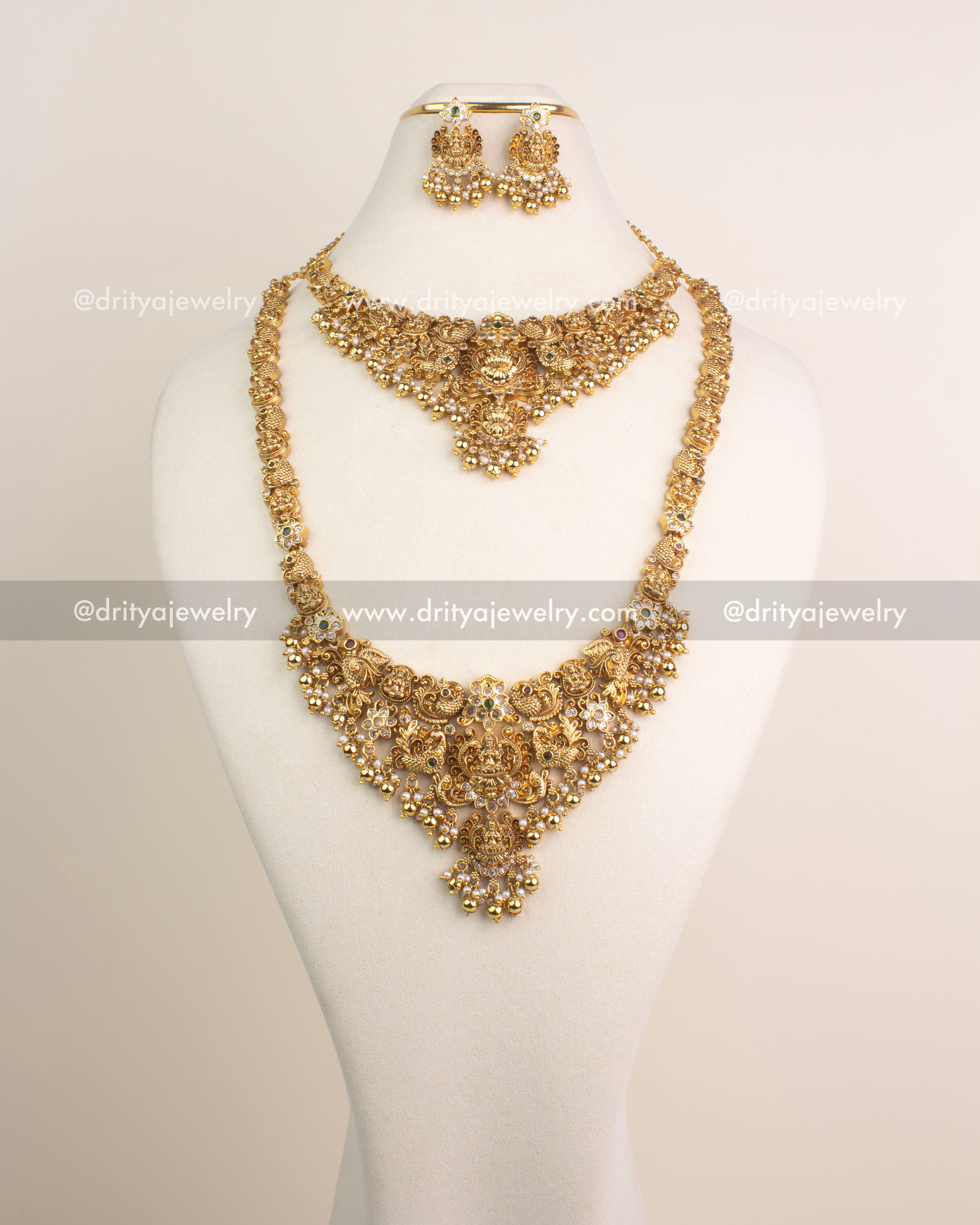 Antique gold temple jewelry combo set with Lakshmi motifs, short and long necklaces, and matching jhumkas.
