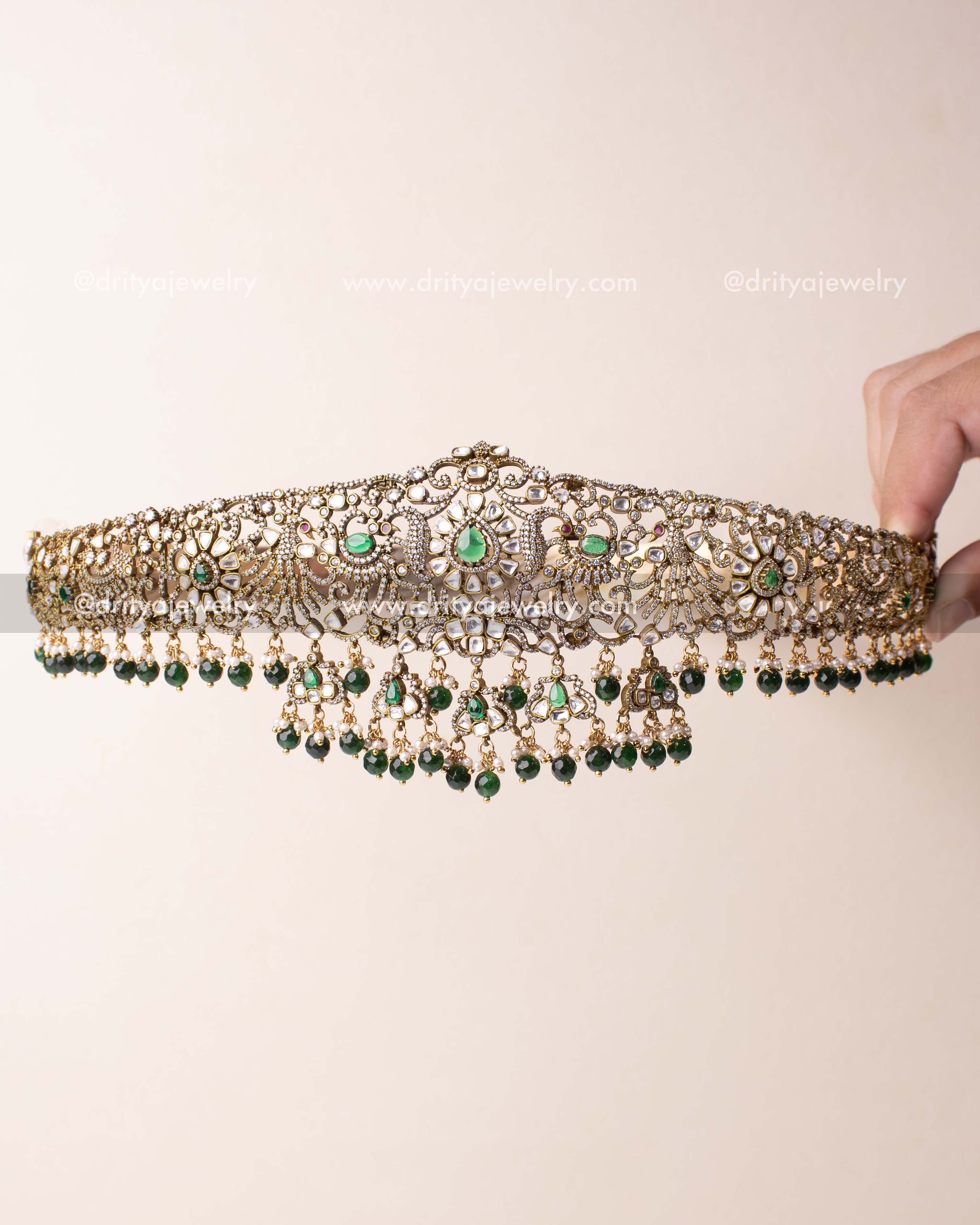 Victorian-style waist belt with uncut kundan stones and green bead danglers.