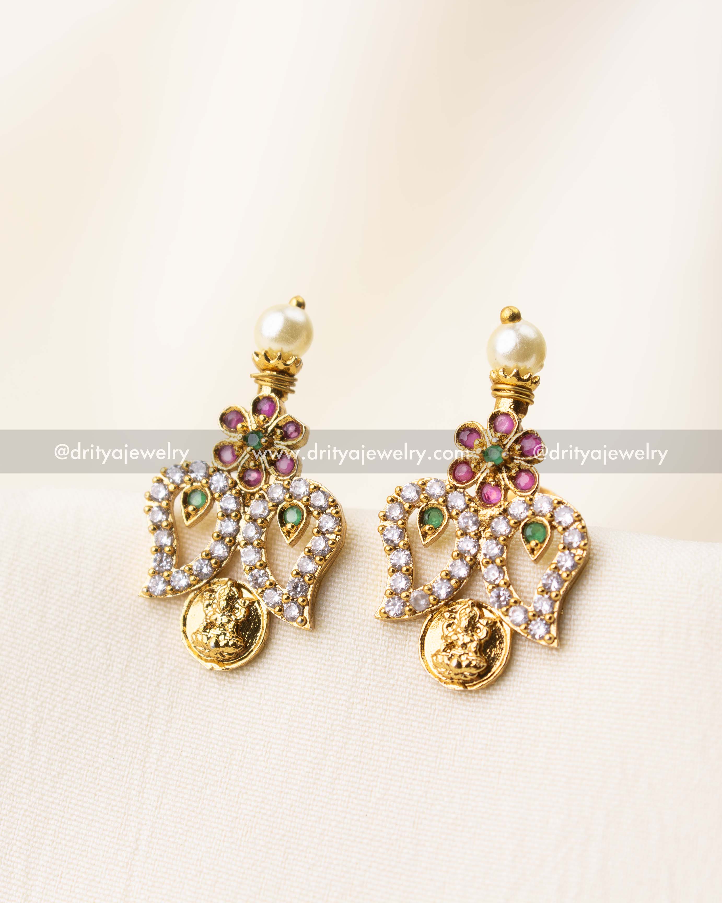 Matching floral top earrings with coin drop and CZ-studded temple design.
