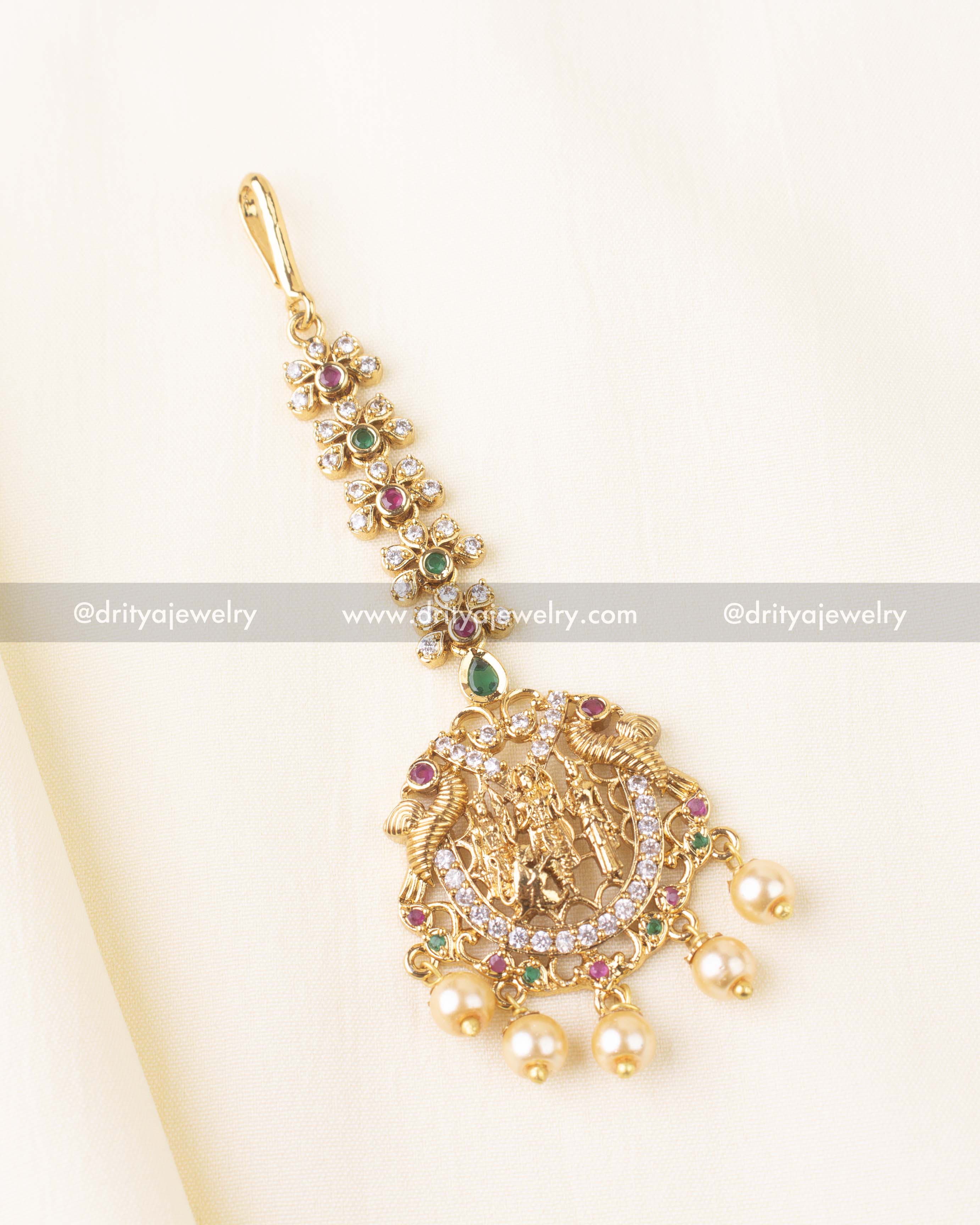 Antique gold maang tikka featuring Ram Parivar design with CZ stones and pearl drops