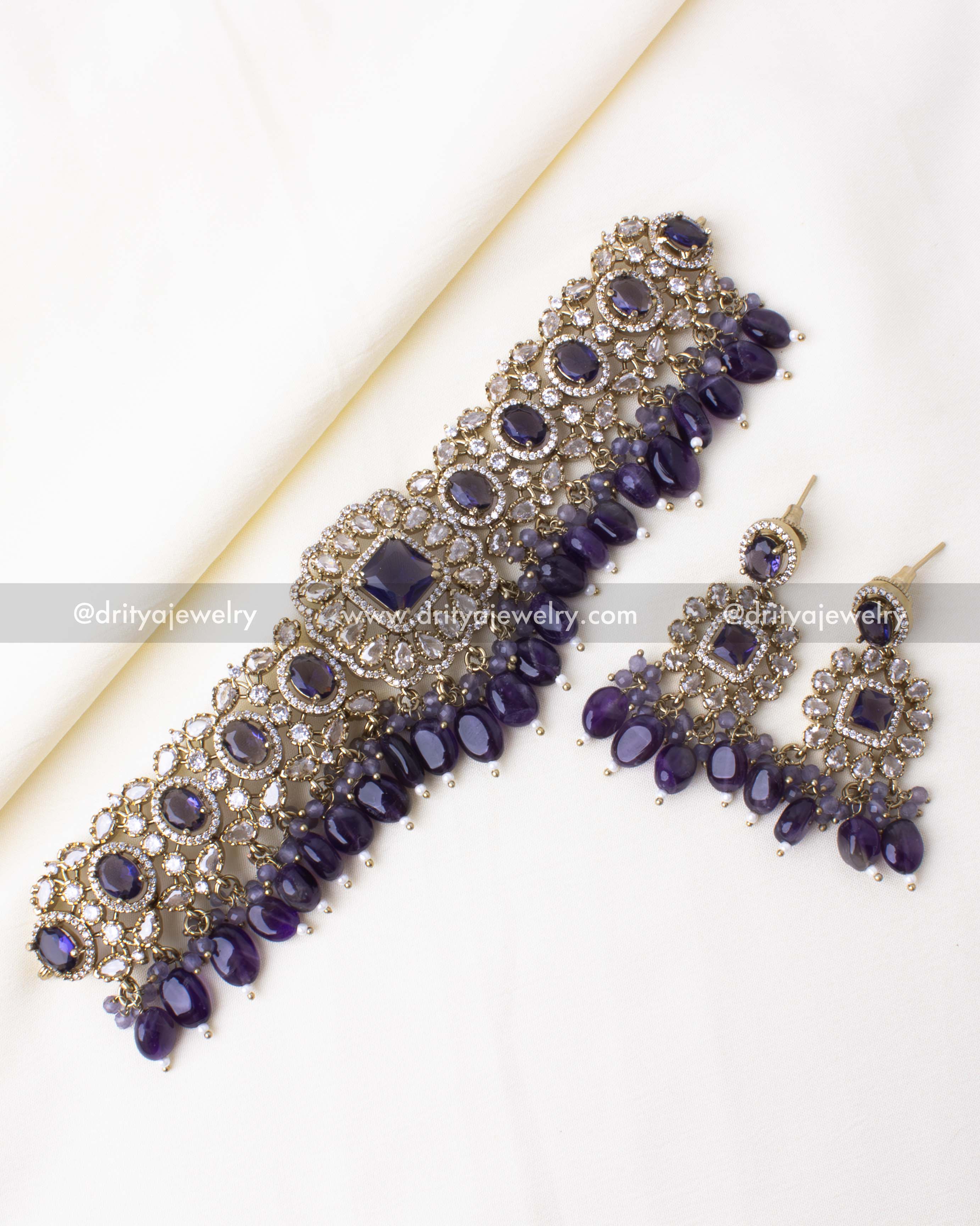 Premium Victorian choker set featuring amethyst stones and zircon accents, paired with matching chandelier earrings.