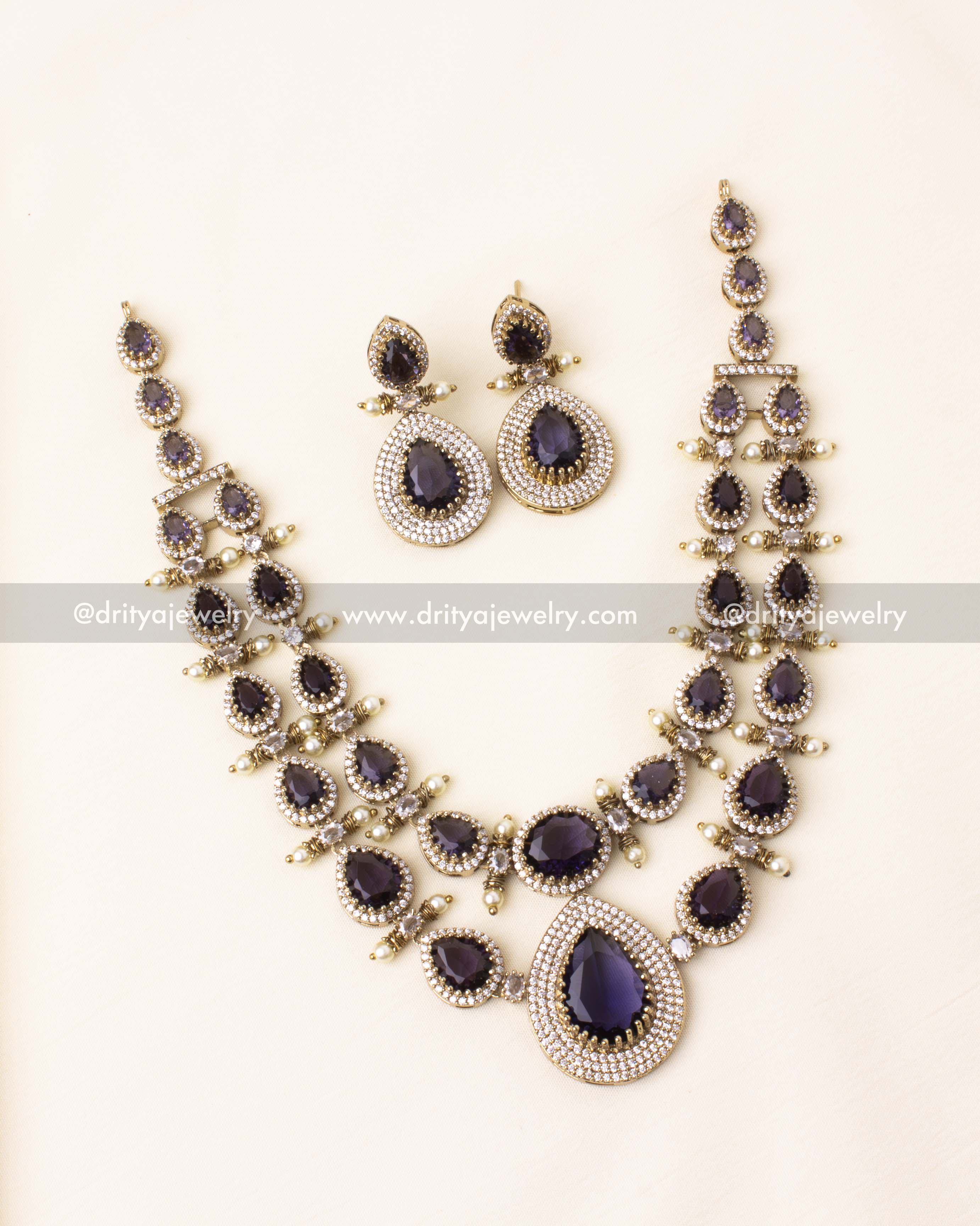 Opulent Victorian layered necklace set featuring deep purple gemstones and AD accents.