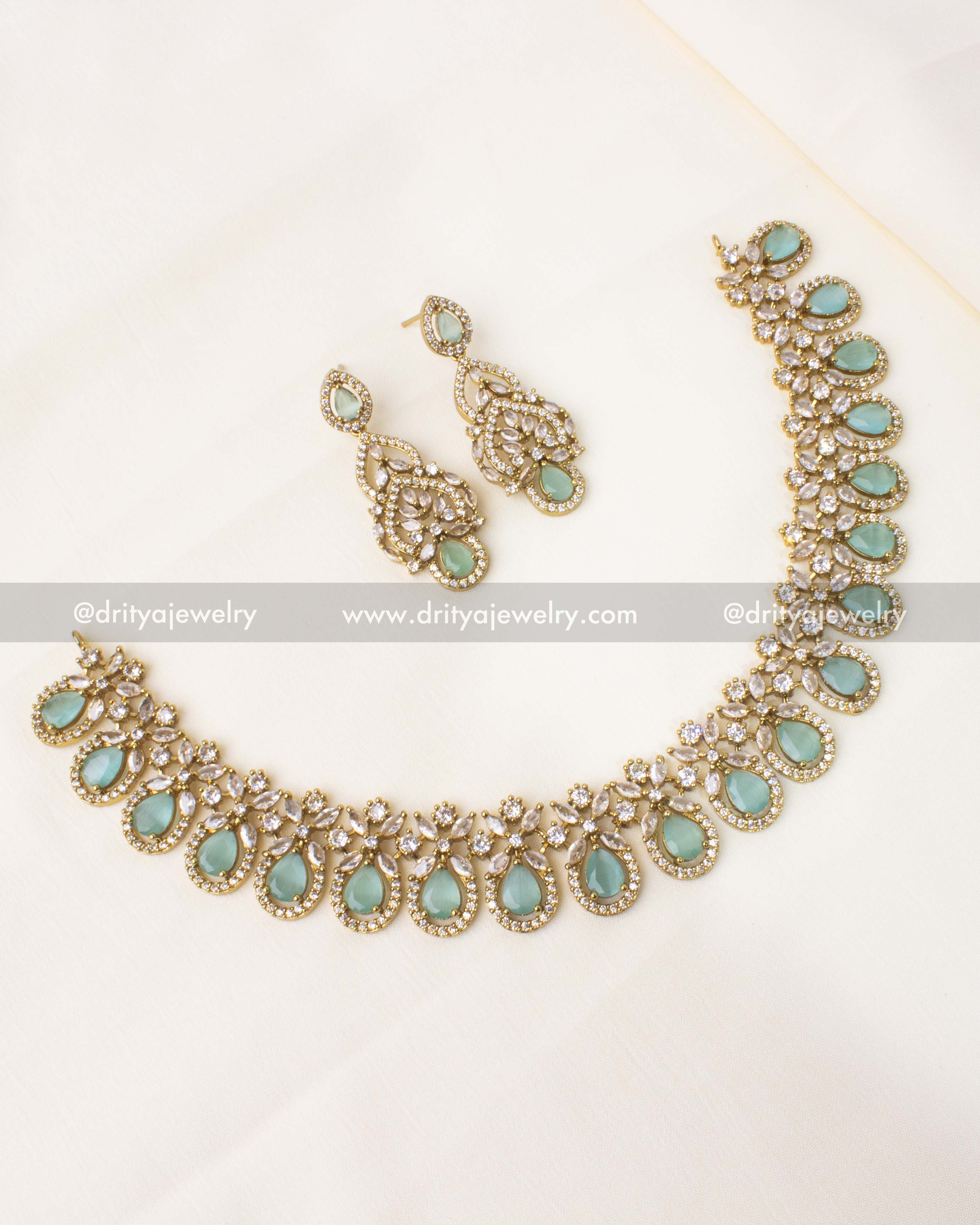 Elegant Victorian short necklace set featuring mint teardrop stones and sparkling CZ accents.