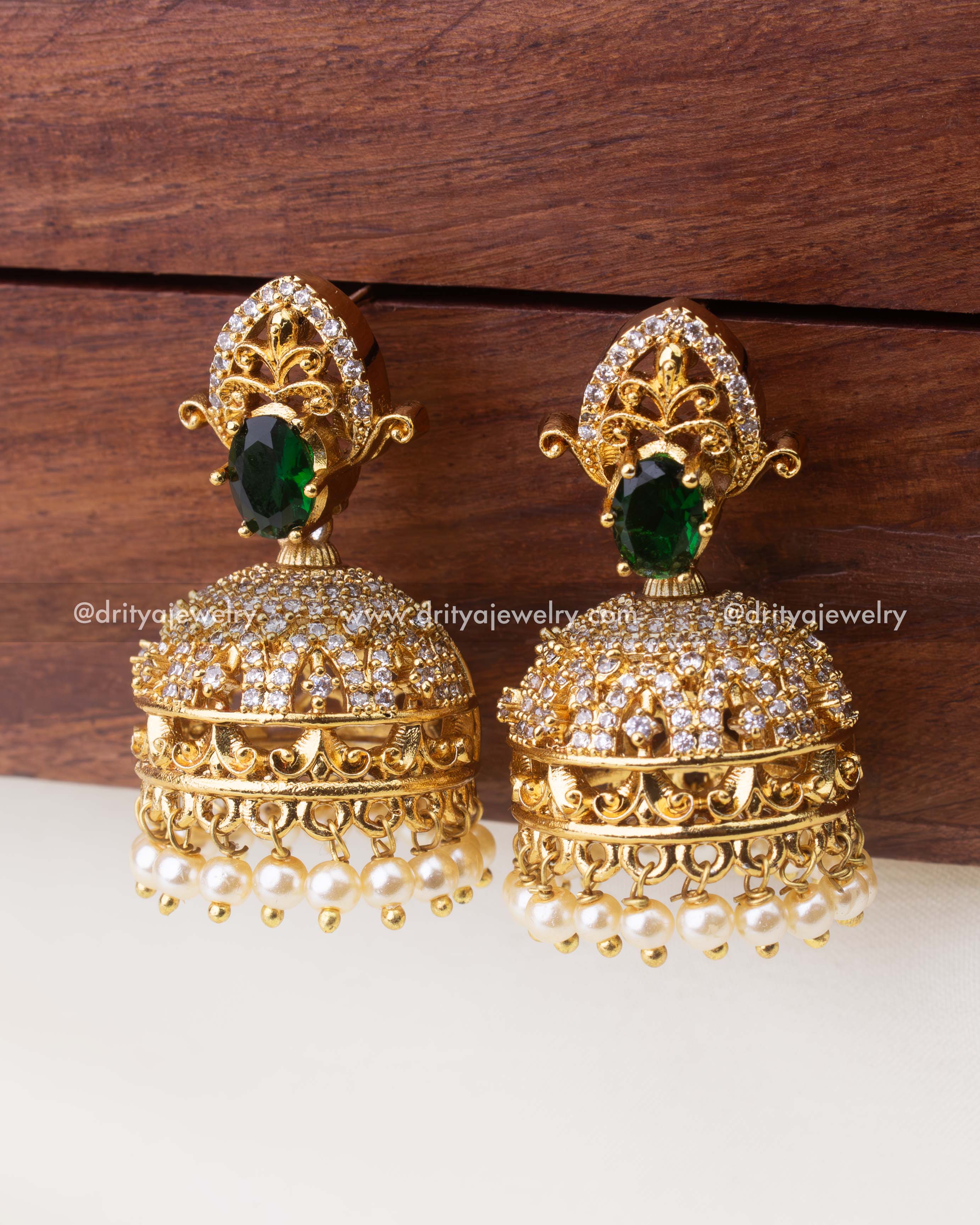 Gold-Plated CZ Jhumka with Emerald Green Stone