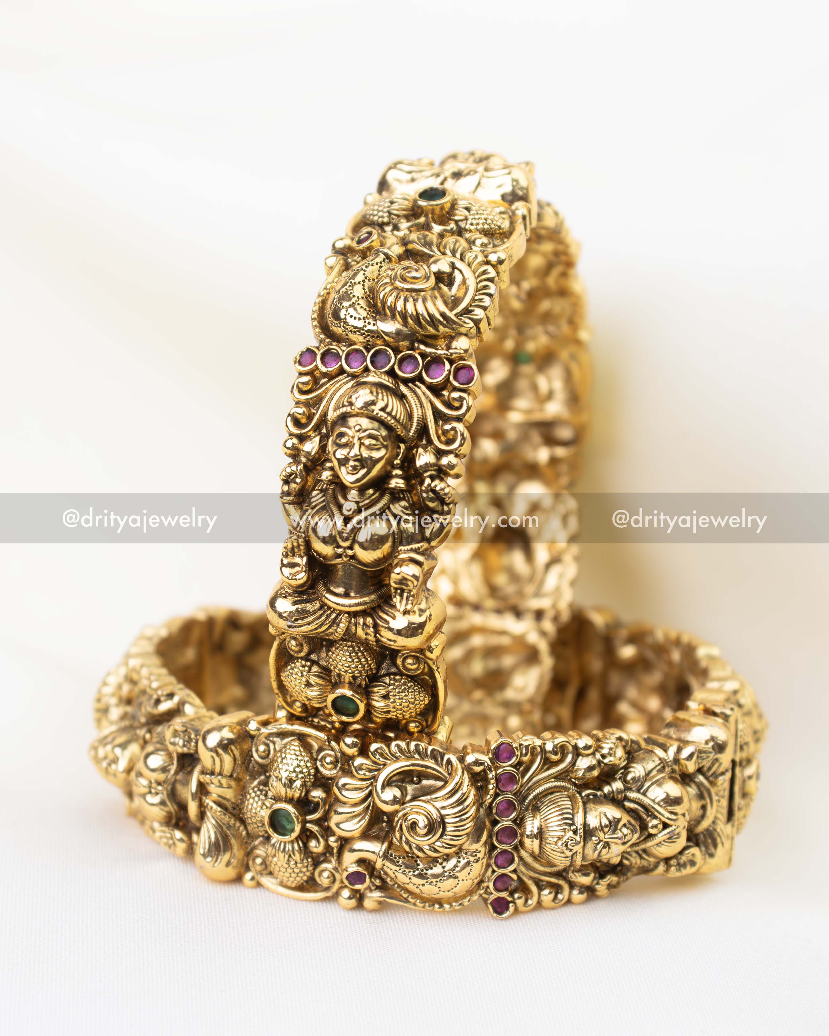 Antique gold bridal temple bangles with Lakshmi motif and Nakshi detailing