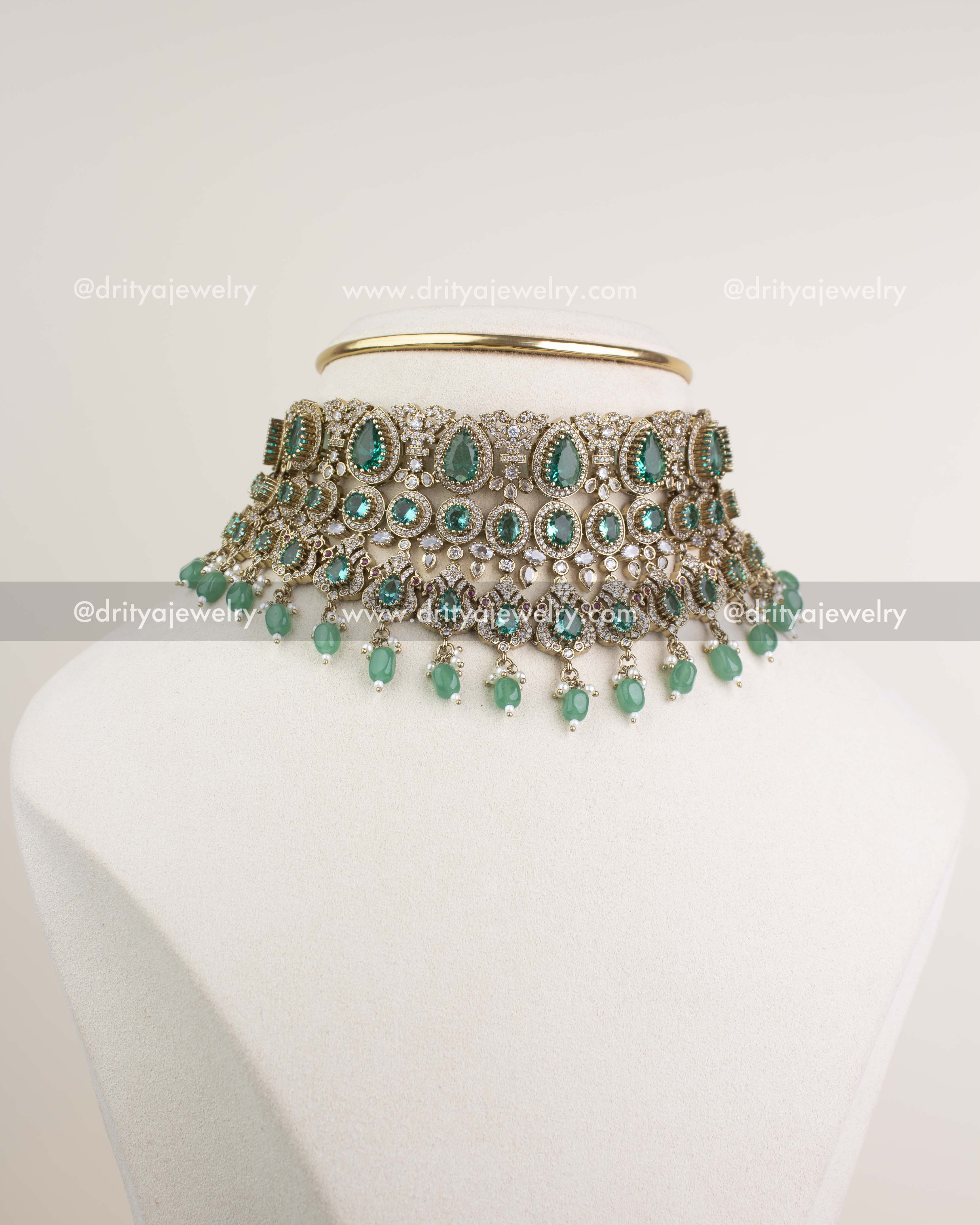 Premium Victorian bridal choker set in Russian emerald with multi-layer detailing, AD stones, and bead droplets.