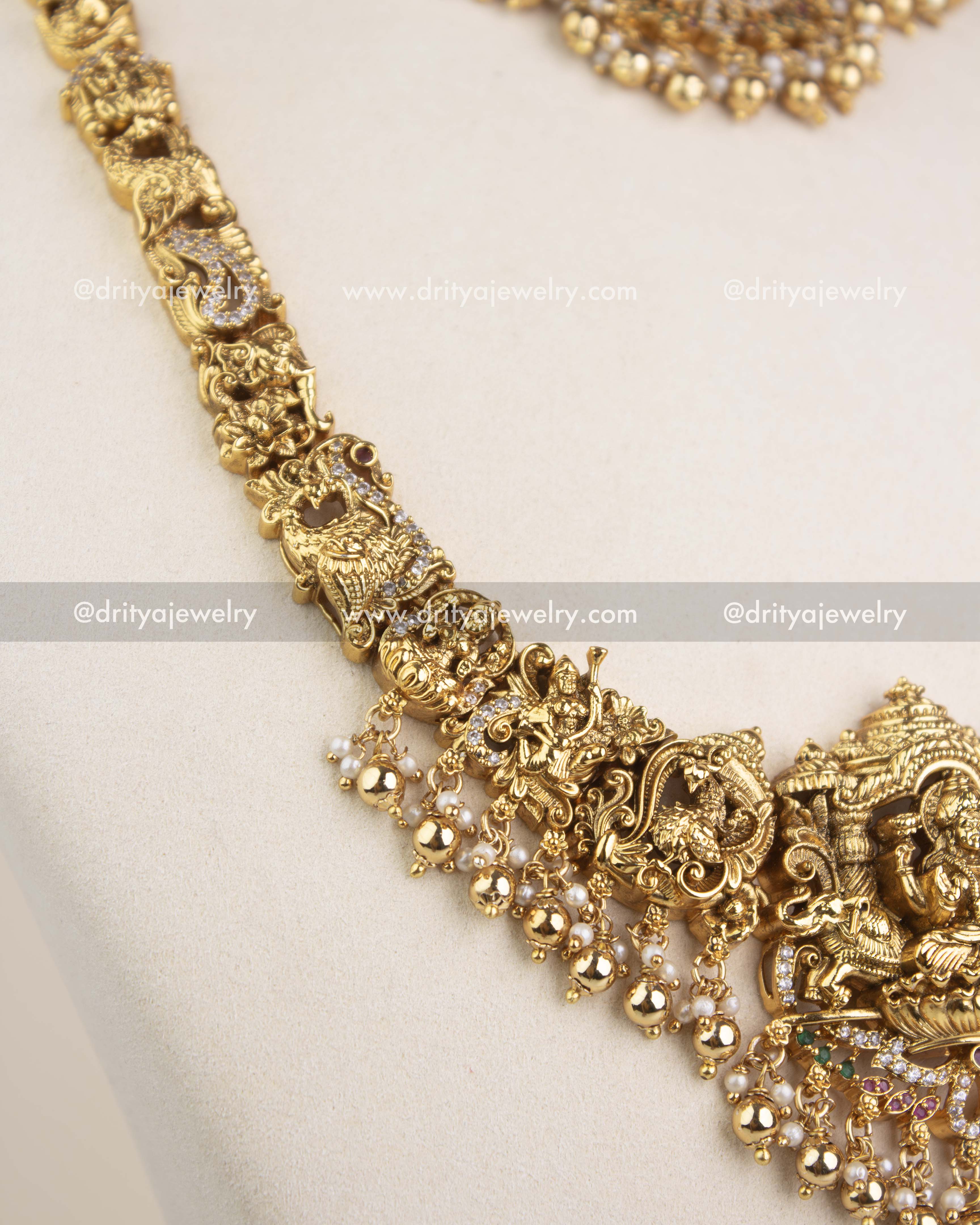 Beautiful nakshi chain with deity carvings and CZ detailing