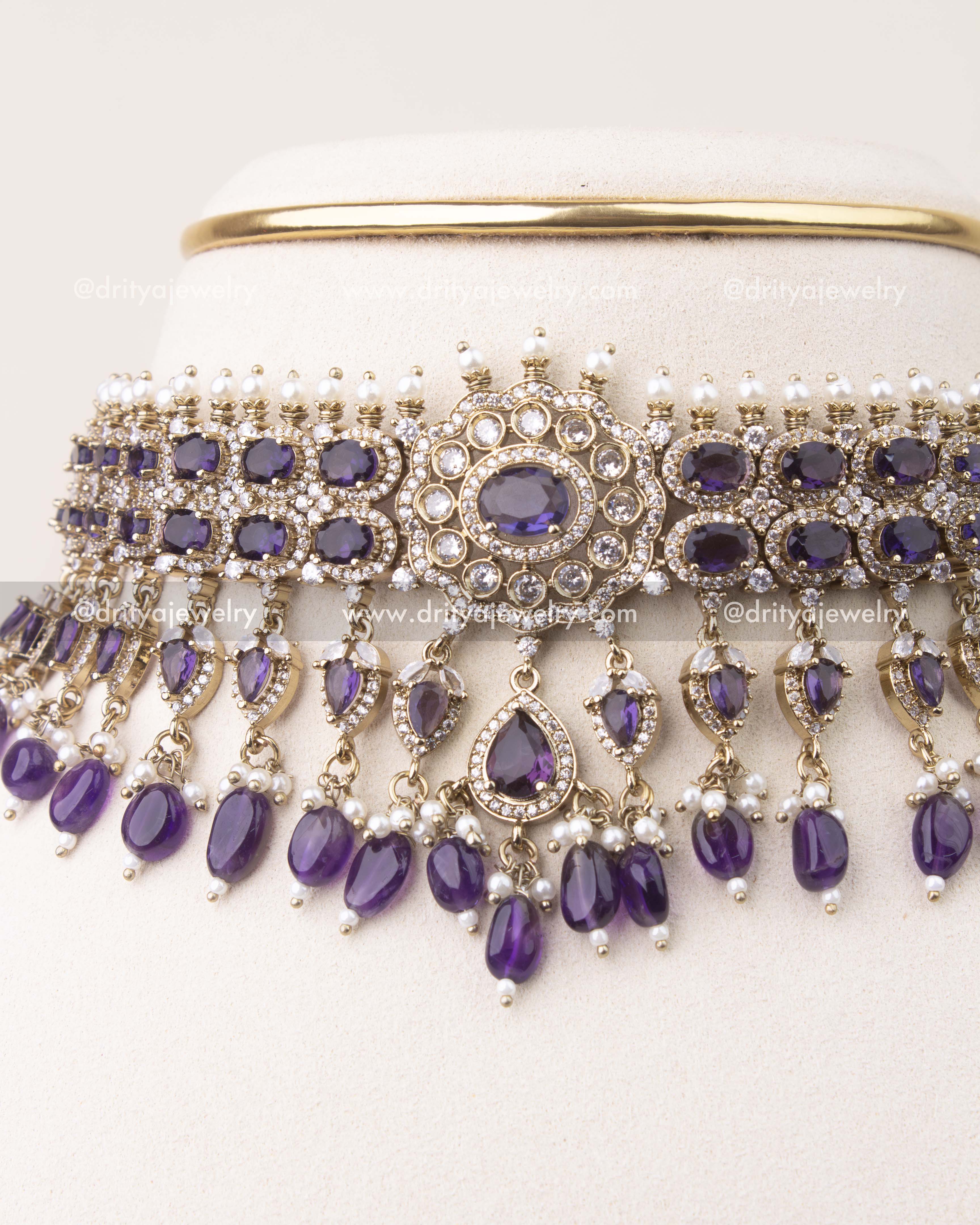 Close-up of Victorian choker featuring deep purple stones, crystal detailing, and pearl hangings