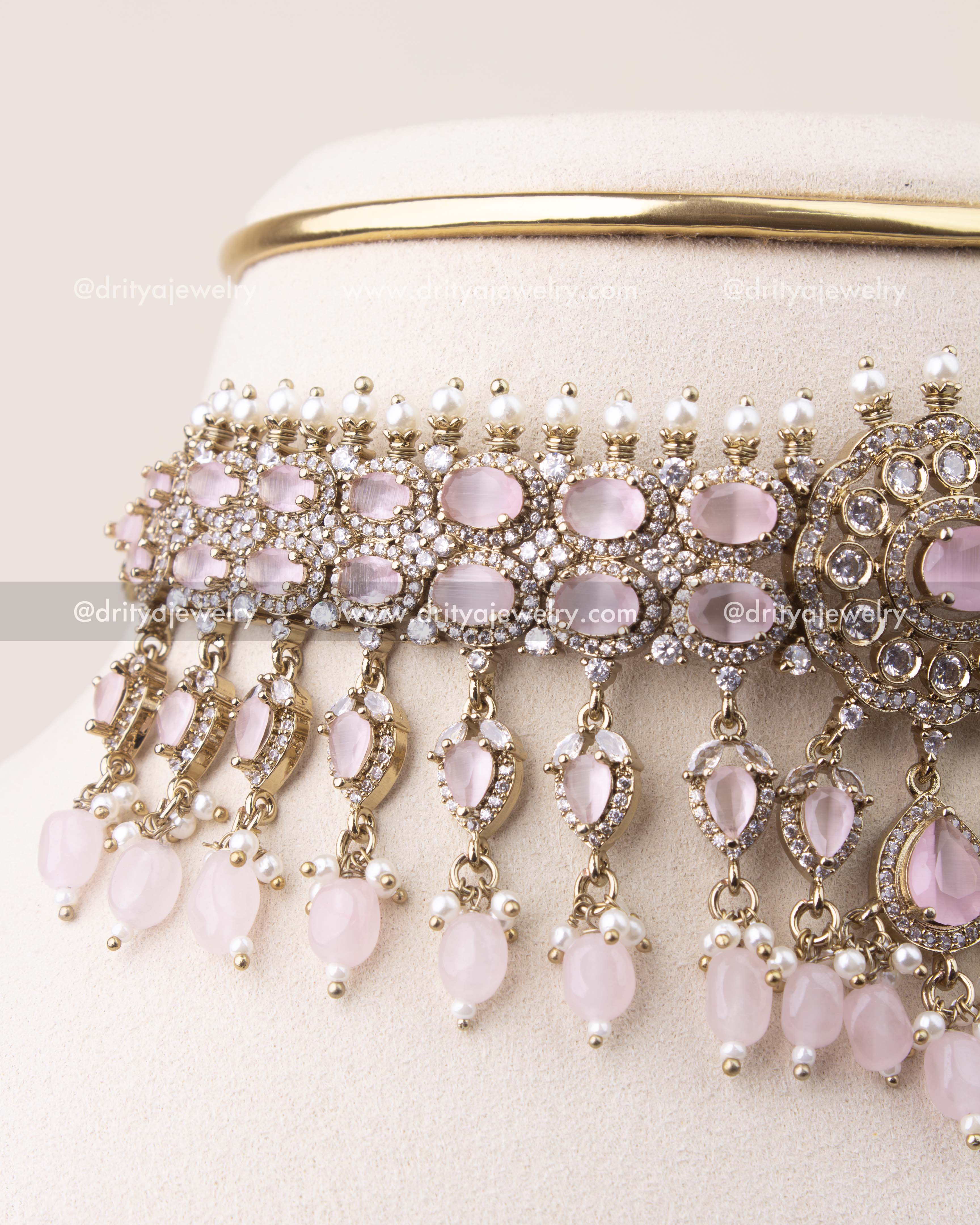 Close-up of blush pink stone Victorian choker featuring crystal detailing and pearl hangings
