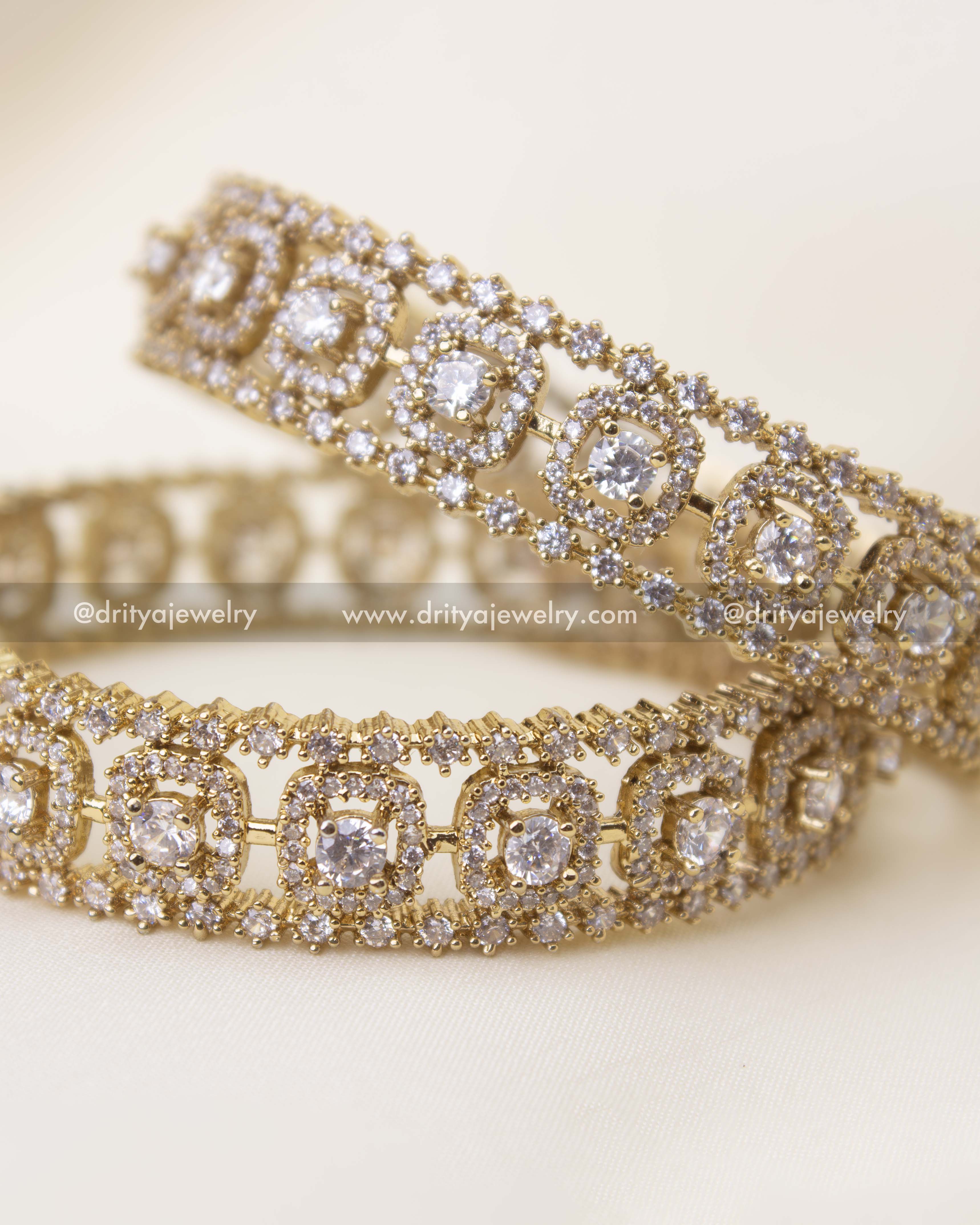 Close-up of Victorian polish bangles featuring diamond-alike stones