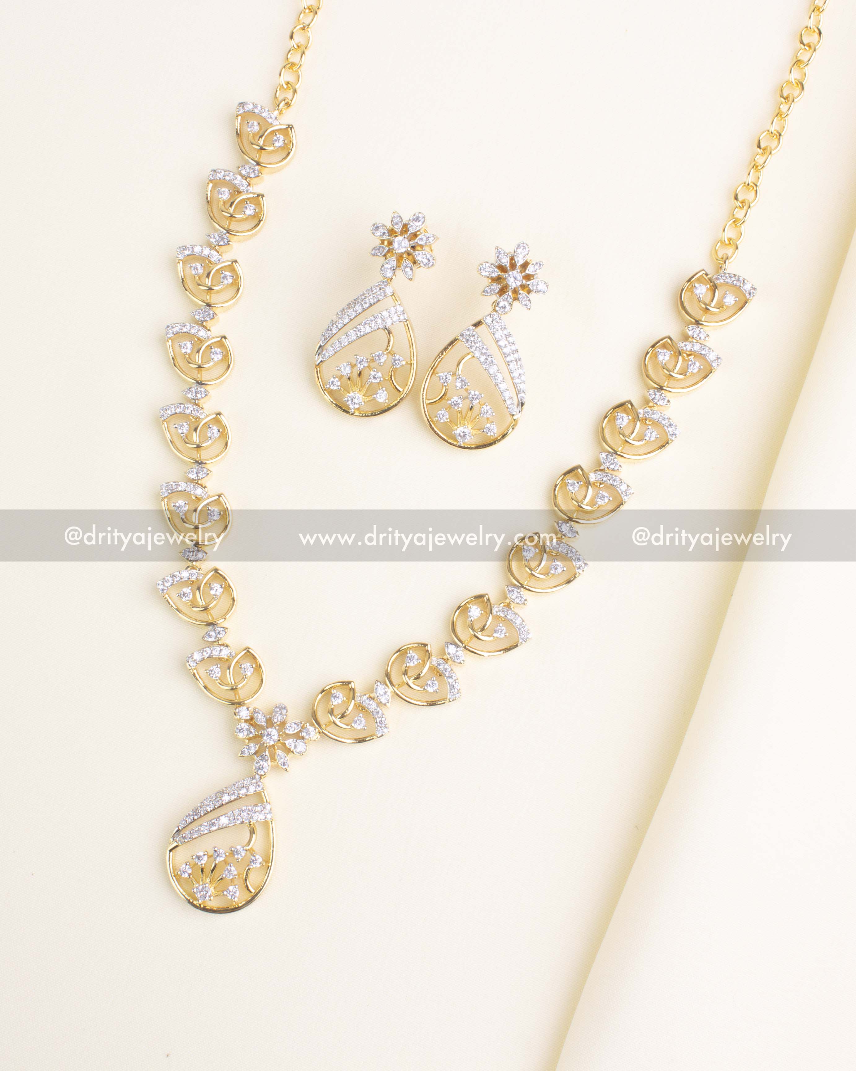 SKU 1180 - Complete CZ teardrop floral necklace set with earrings
