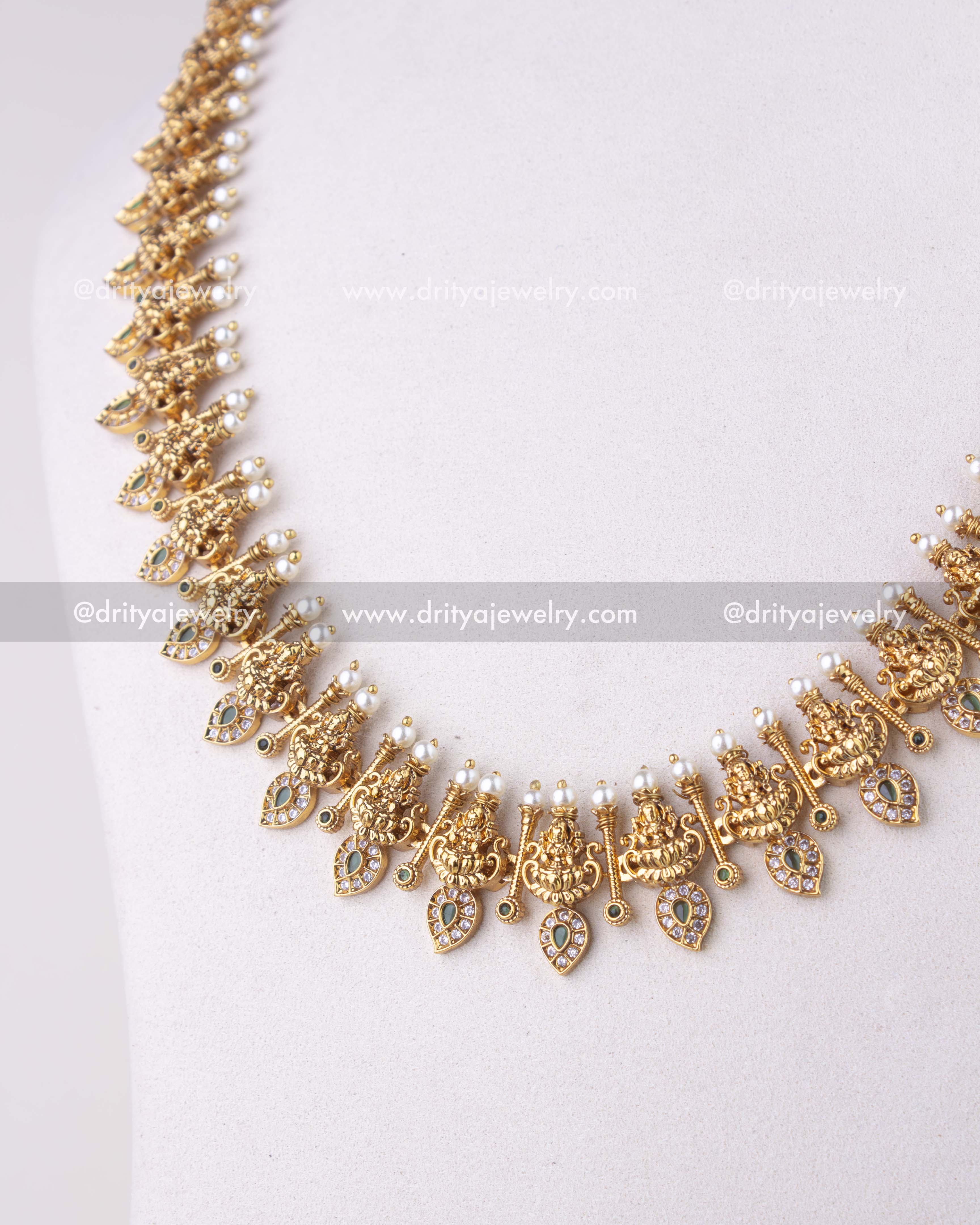 1279-G close-up of mango design necklace with god idol motifs and pearl edging