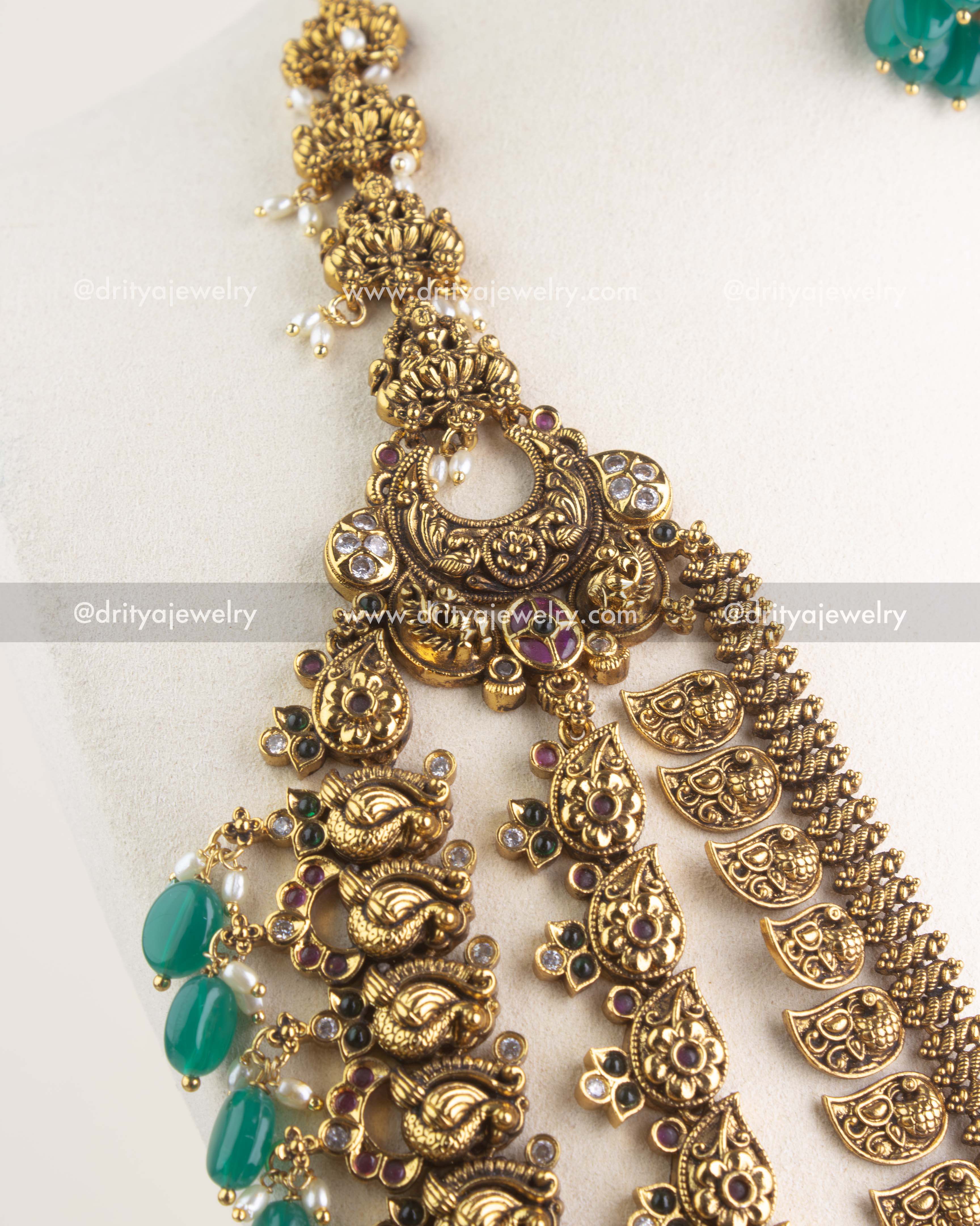 SKU 1164 Necklace Set close view of upper necklace sections with antique gold replica nakshi work.
