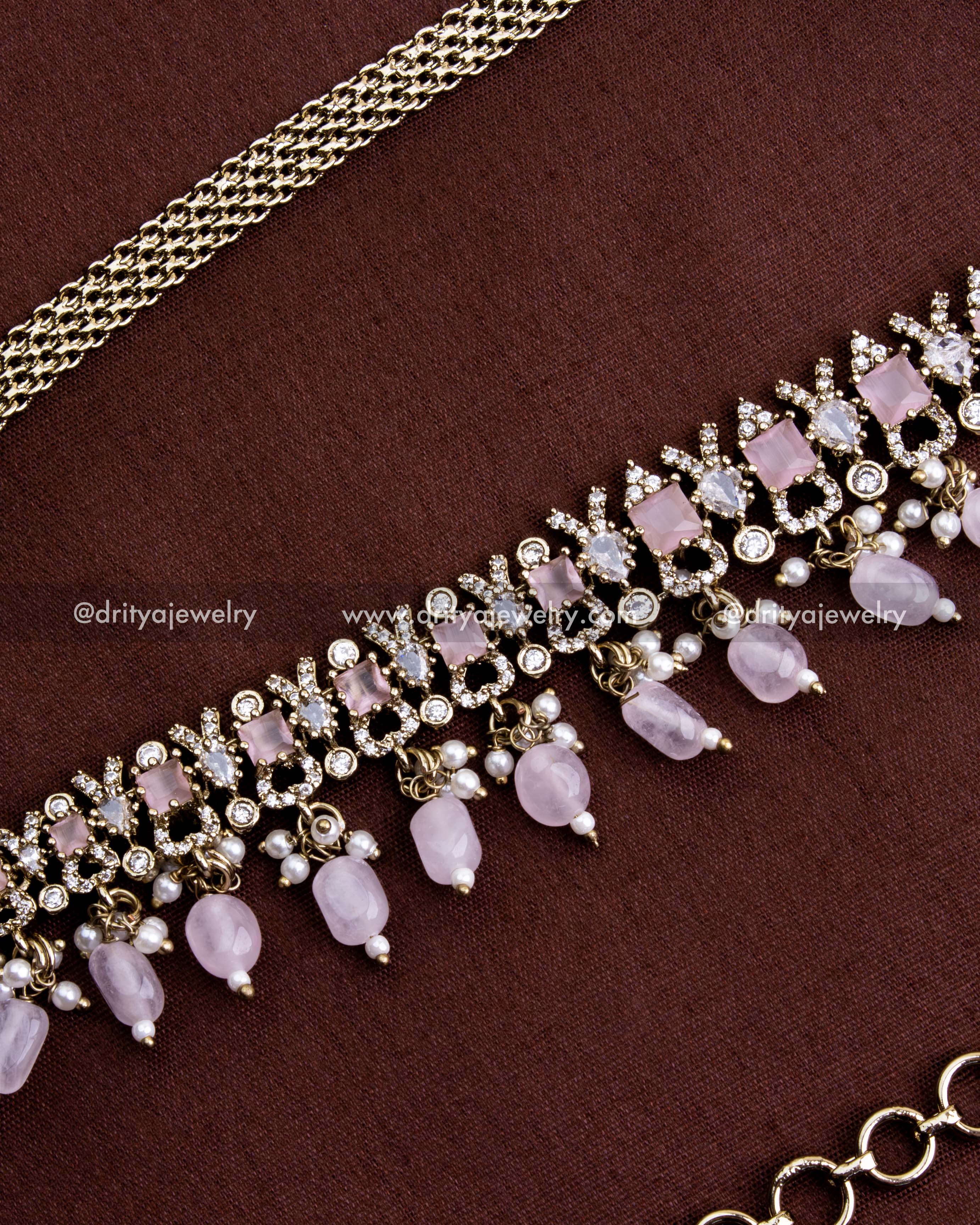 1130-BP hip chain close-up of blush pink stones, CZ detailing and bead drops on gold-toned base