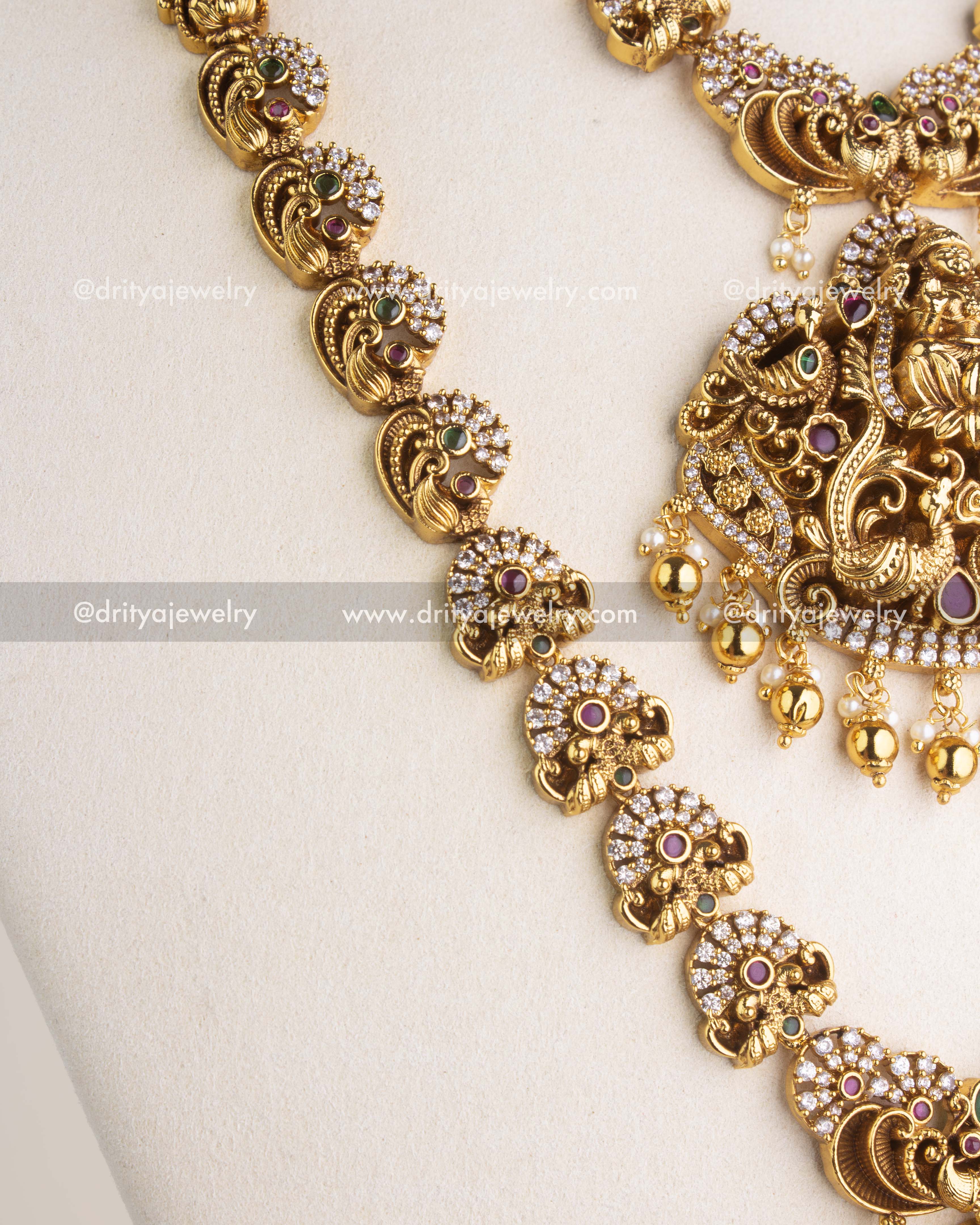 SKU 1163 Necklace Set side view of chain links with peacock-style motifs and coloured stones