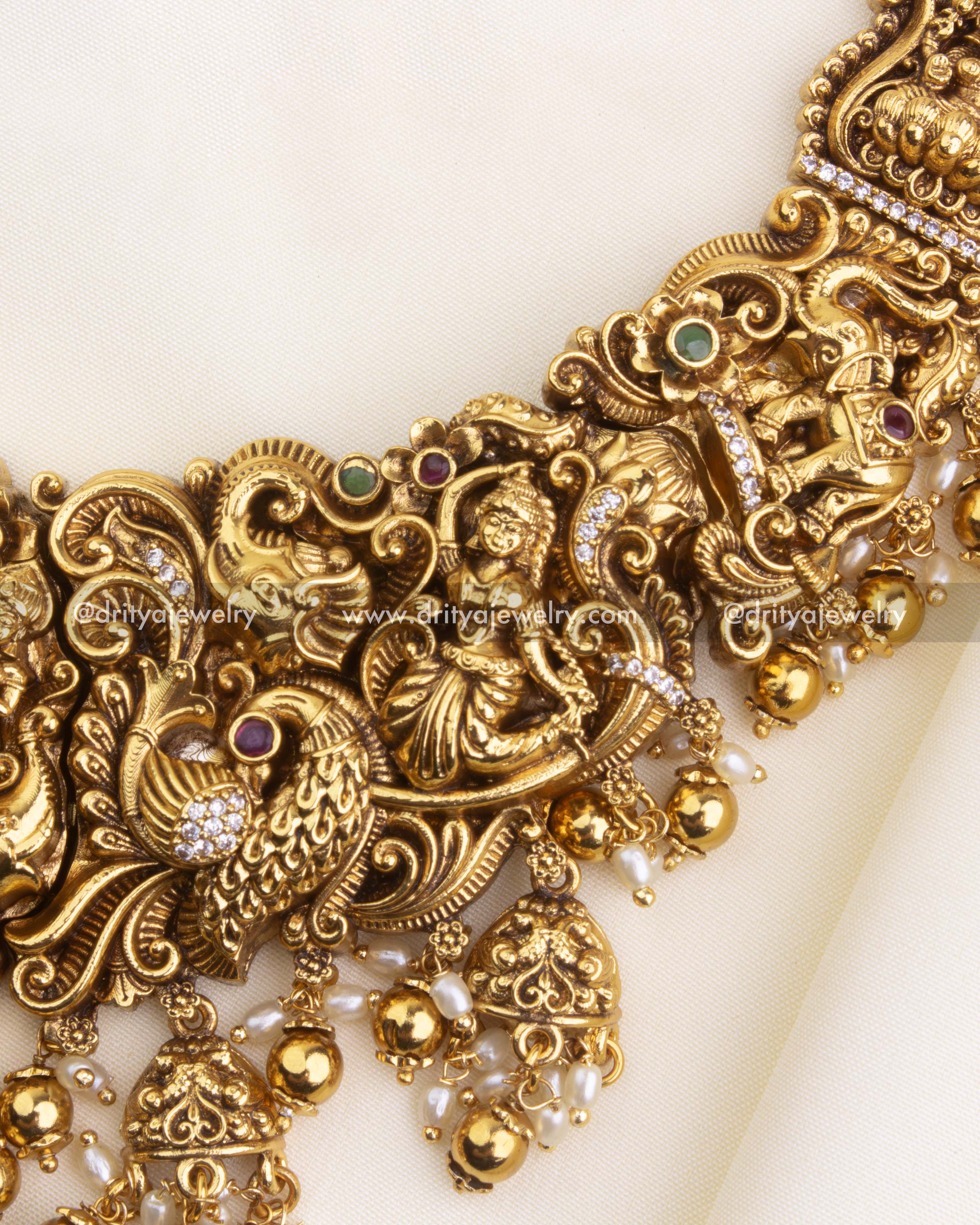 SKU 1167 detailed view of central necklace motifs with peacocks and figurines