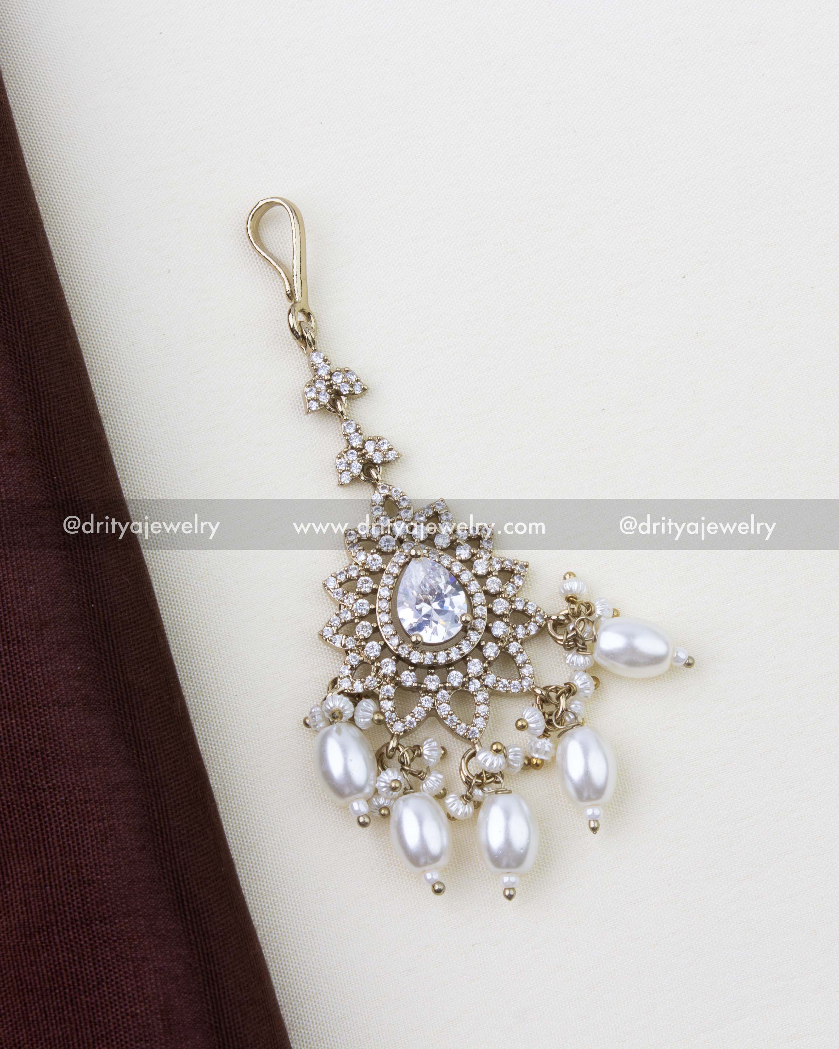 1259-W premium Victorian white stone maang tikka with pearl-like drops laid flat front view