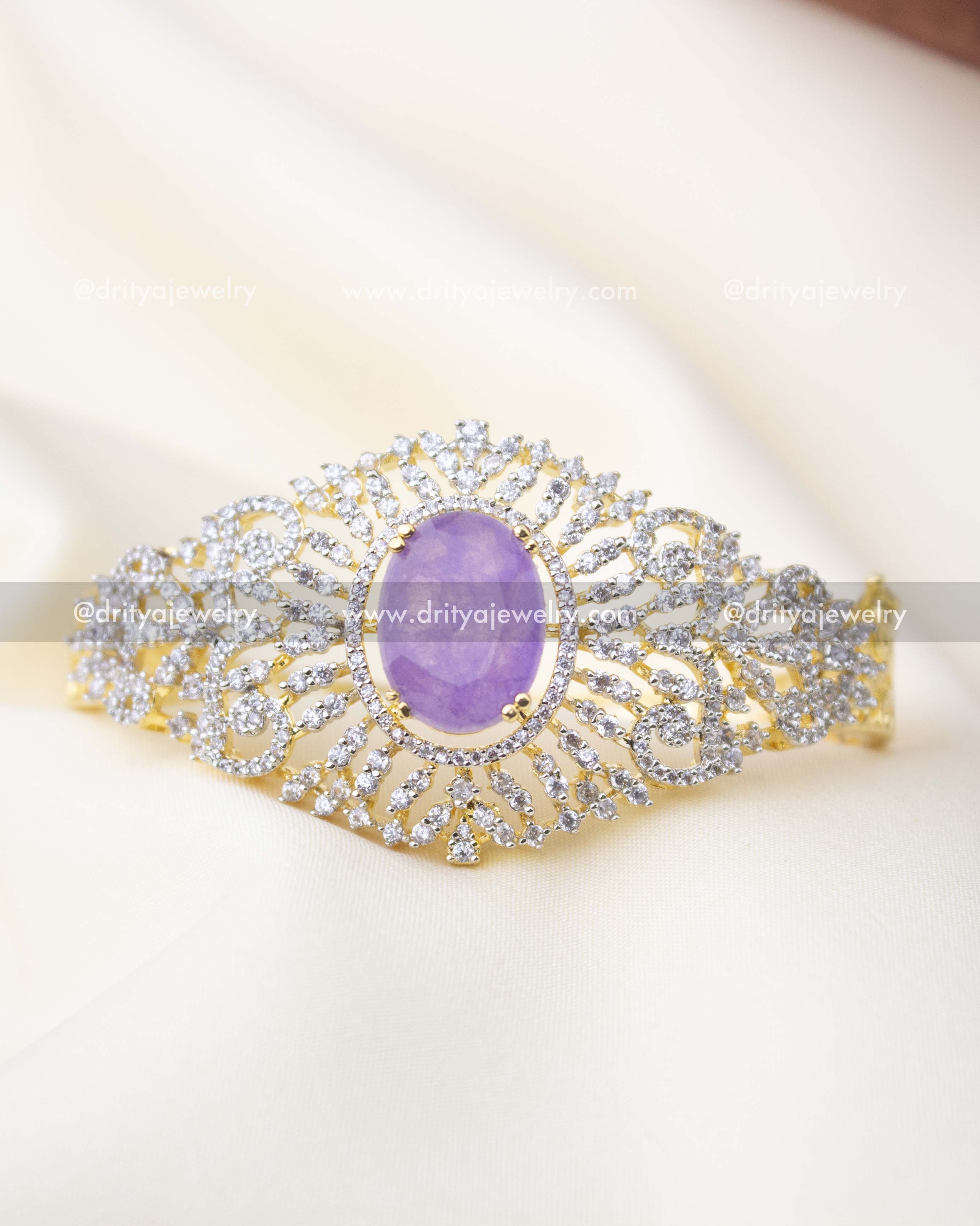 1295-PU front view of kada with crackled purple center stone and stone-studded halo
